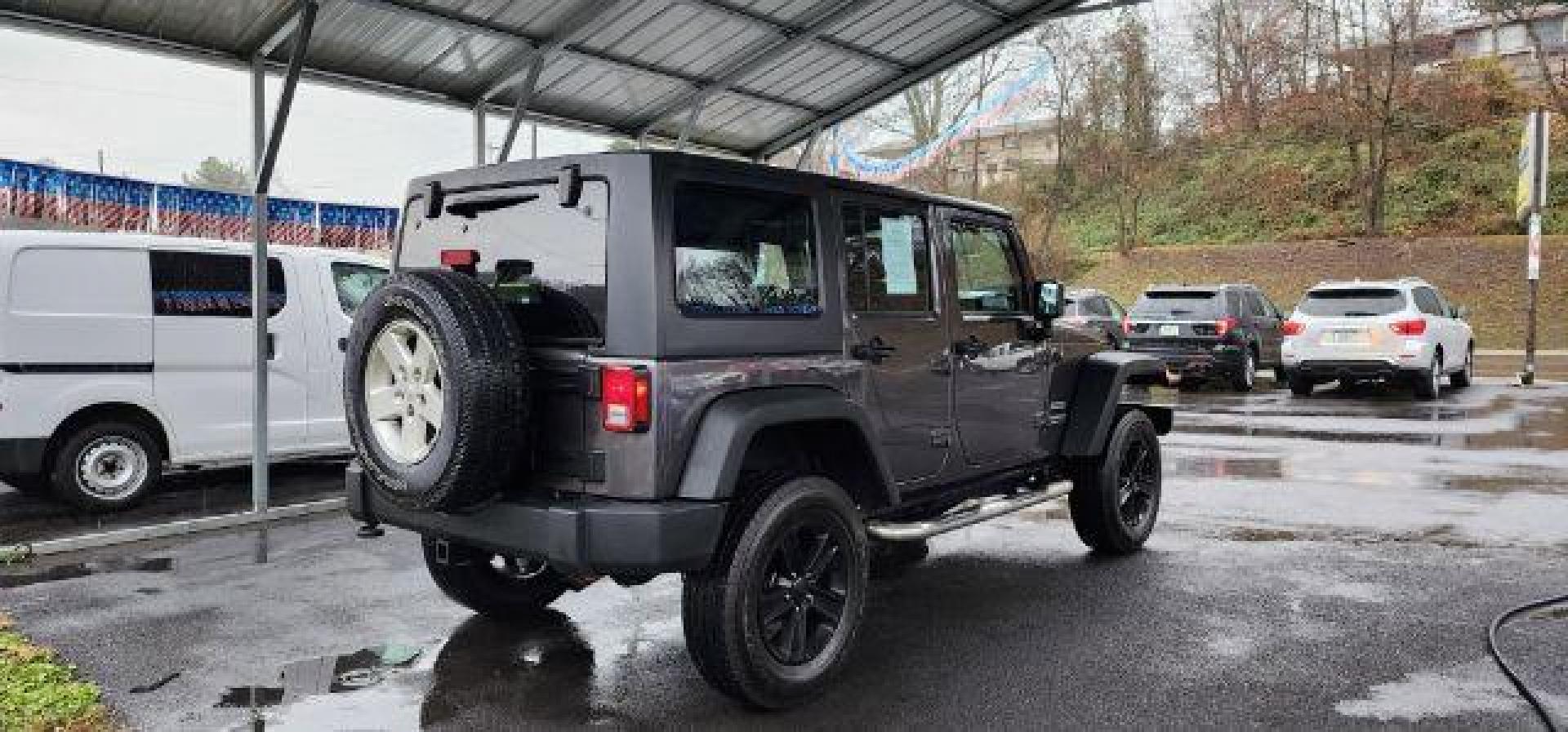 2014 GRAY /Black Jeep Wrangler Unlimited Sport 4WD (1C4BJWDG8EL) with an 3.6L V6 engine, AT transmission, located at 353 S. Mineral St., Keyser, WV, 26726, (304) 788-7887, 39.436451, -78.981674 - FOR A BETTER PRICE CALL PAUL AT 301-268-8150 - Photo#12