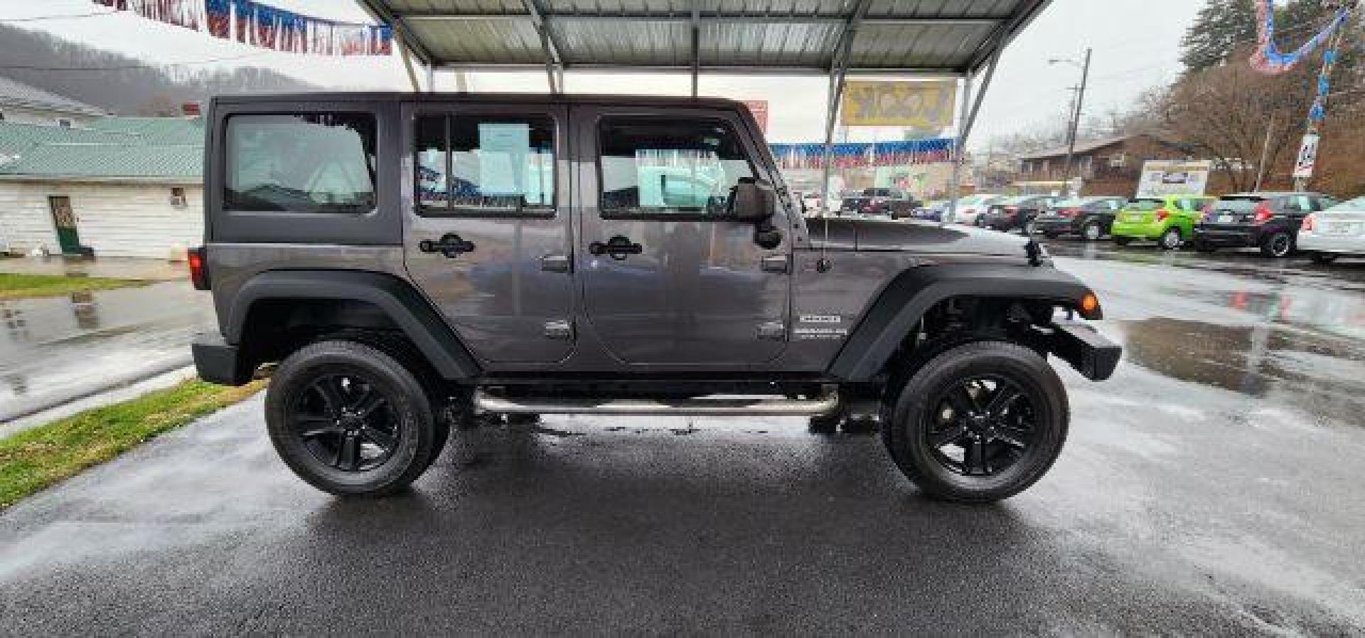 2014 GRAY /Black Jeep Wrangler Unlimited Sport 4WD (1C4BJWDG8EL) with an 3.6L V6 engine, AT transmission, located at 353 S. Mineral St., Keyser, WV, 26726, (304) 788-7887, 39.436451, -78.981674 - FOR A BETTER PRICE CALL PAUL AT 301-268-8150 - Photo#13