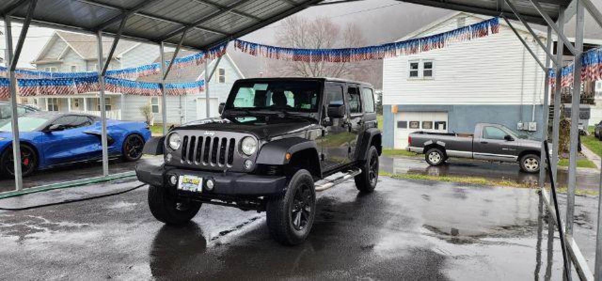 2014 GRAY /Black Jeep Wrangler Unlimited Sport 4WD (1C4BJWDG8EL) with an 3.6L V6 engine, AT transmission, located at 353 S. Mineral St., Keyser, WV, 26726, (304) 788-7887, 39.436451, -78.981674 - FOR A BETTER PRICE CALL PAUL AT 301-268-8150 - Photo#2