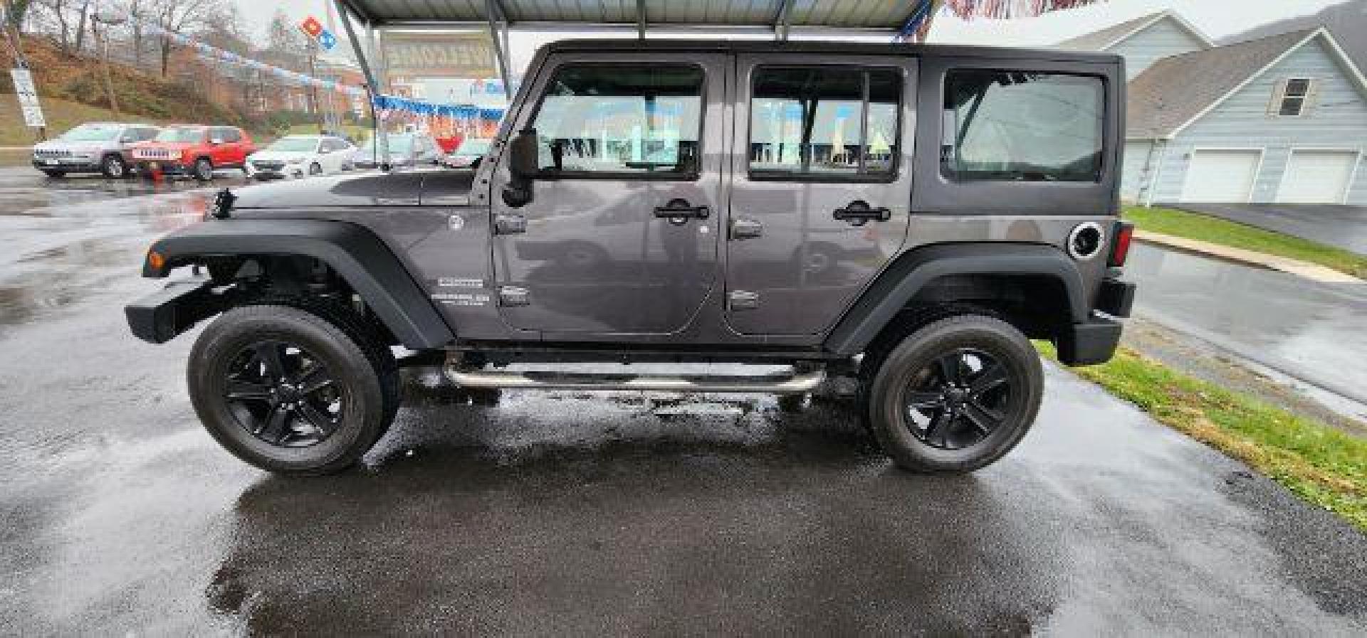 2014 GRAY /Black Jeep Wrangler Unlimited Sport 4WD (1C4BJWDG8EL) with an 3.6L V6 engine, AT transmission, located at 353 S. Mineral St., Keyser, WV, 26726, (304) 788-7887, 39.436451, -78.981674 - FOR A BETTER PRICE CALL PAUL AT 301-268-8150 - Photo#3