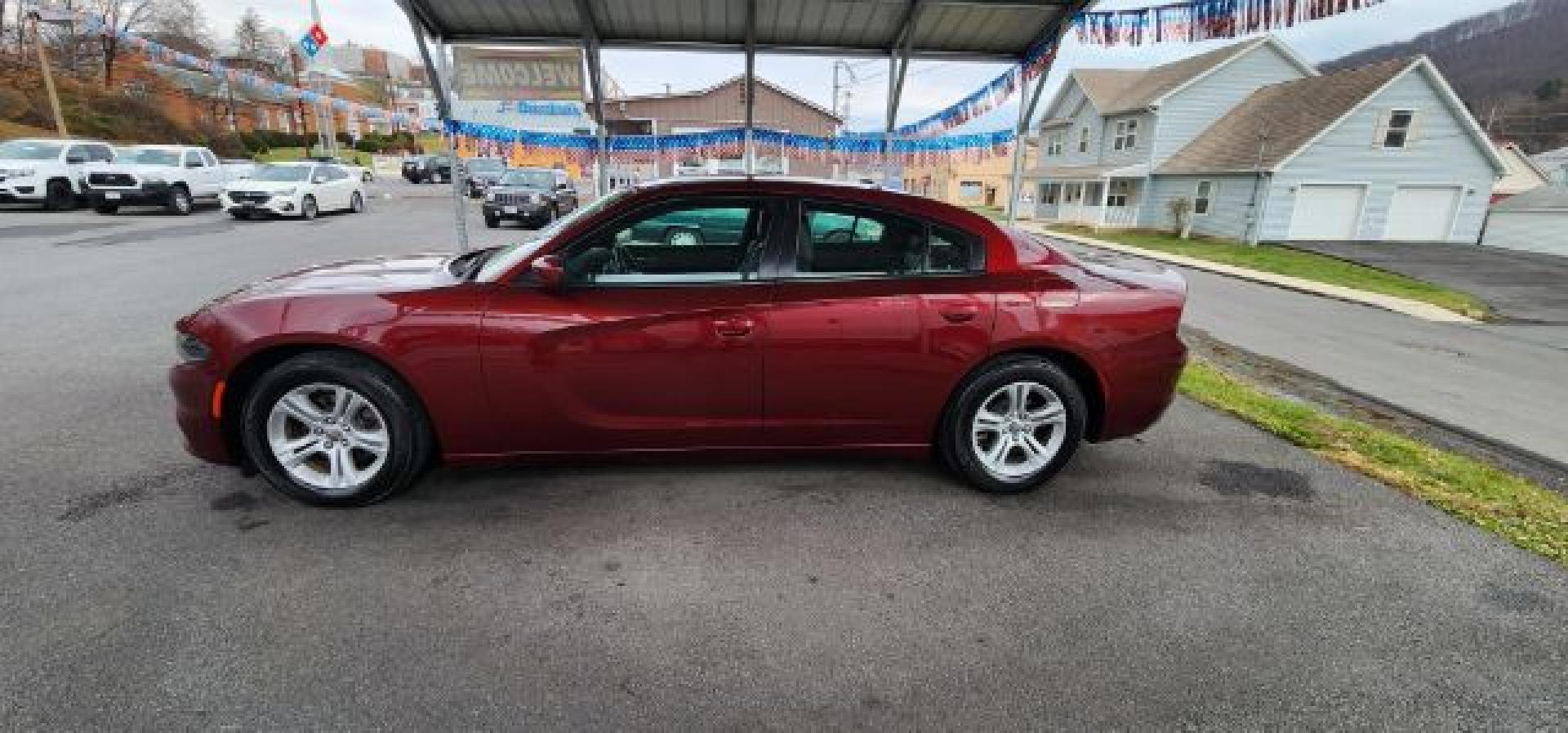2021 Maroon /Black, premium leather Dodge Charger SXT (2C3CDXBG4MH) with an 3.6L V6 engine, AT transmission, located at 353 S. Mineral St., Keyser, WV, 26726, (304) 788-7887, 39.436451, -78.981674 - FOR A BETTER PRICE CALL PAUL AT 301-268-8150- Photo#3
