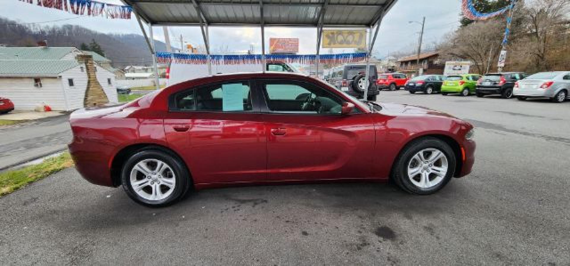 2021 Maroon /Black, premium leather Dodge Charger SXT (2C3CDXBG4MH) with an 3.6L V6 engine, AT transmission, located at 353 S. Mineral St., Keyser, WV, 26726, (304) 788-7887, 39.436451, -78.981674 - FOR A BETTER PRICE CALL PAUL AT 301-268-8150- Photo#13