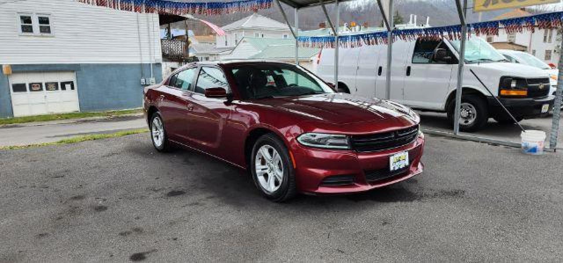 2021 Maroon /Black, premium leather Dodge Charger SXT (2C3CDXBG4MH) with an 3.6L V6 engine, AT transmission, located at 353 S. Mineral St., Keyser, WV, 26726, (304) 788-7887, 39.436451, -78.981674 - Photo#0