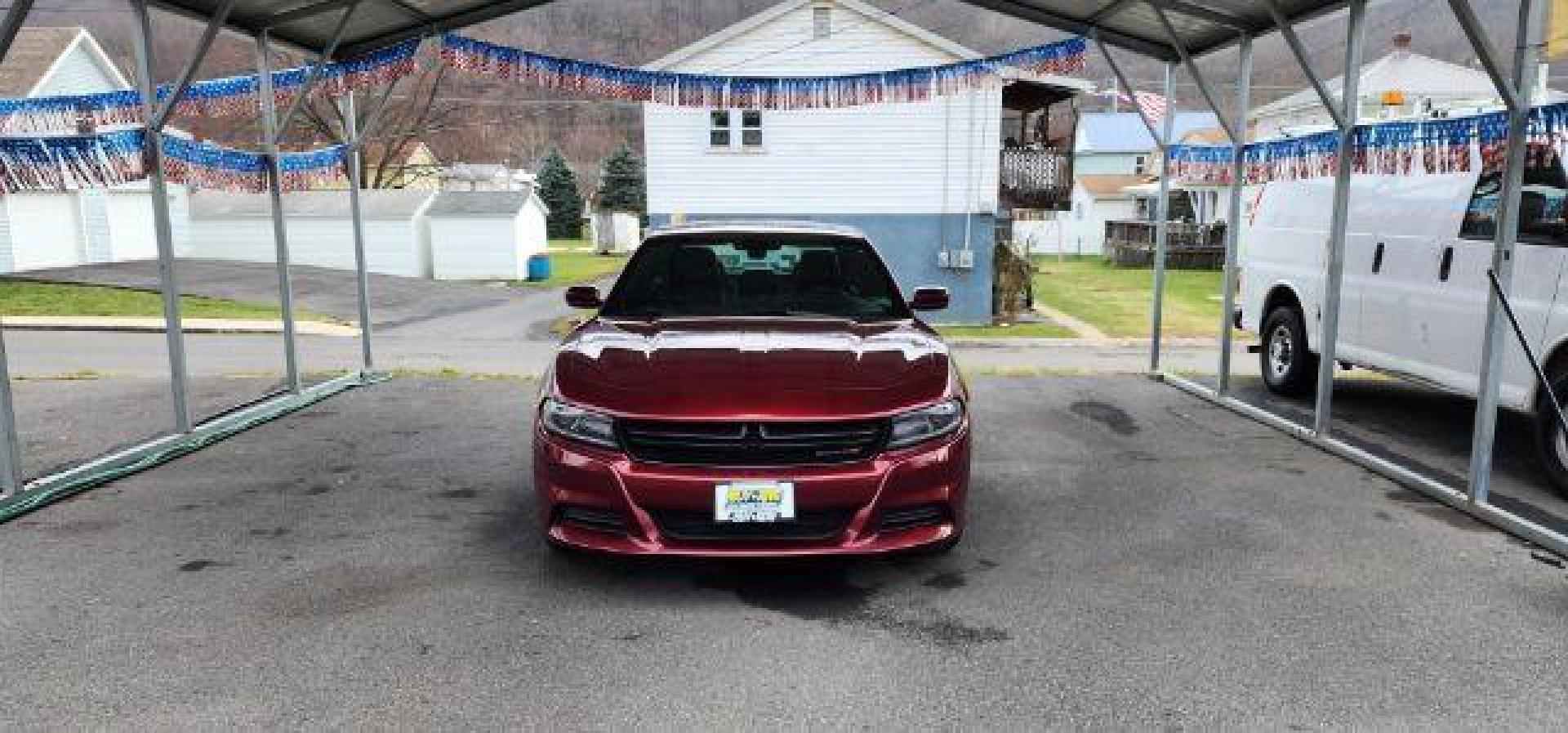 2021 Maroon /Black, premium leather Dodge Charger SXT (2C3CDXBG4MH) with an 3.6L V6 engine, AT transmission, located at 353 S. Mineral St., Keyser, WV, 26726, (304) 788-7887, 39.436451, -78.981674 - Photo#1