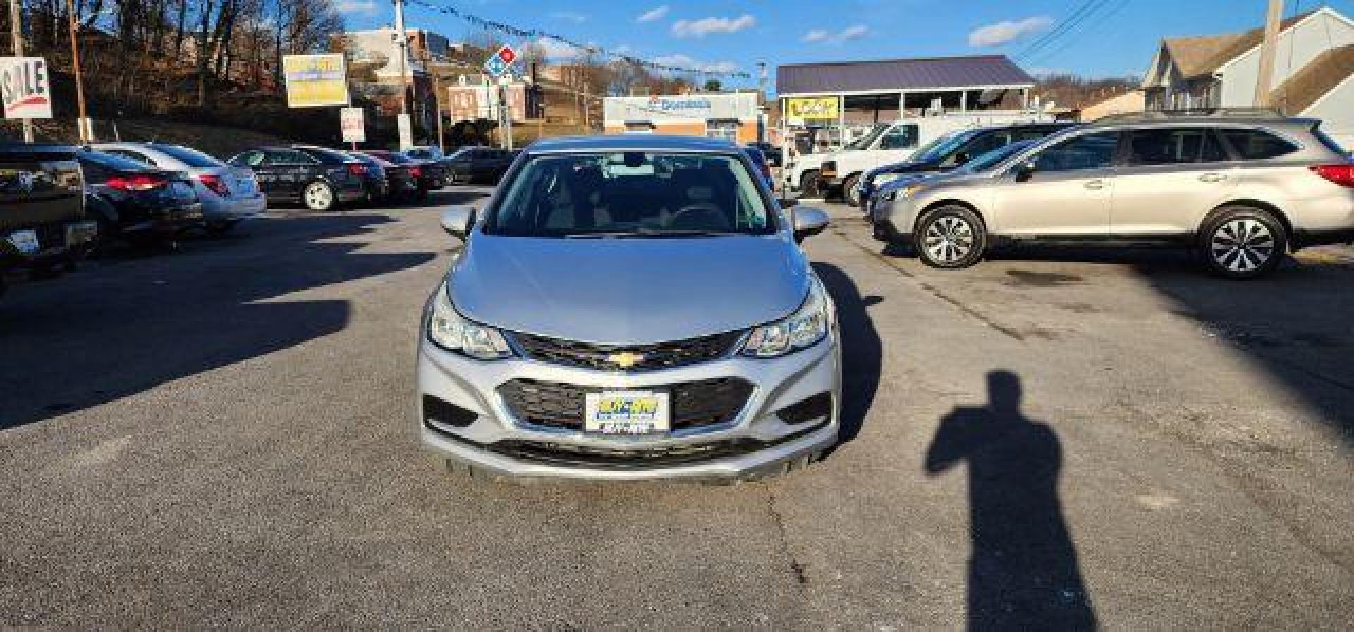 2017 SILVER /Jet Black, cloth Chevrolet Cruze LS Auto (1G1BC5SM8H7) with an 1.4L 4L engine, AT transmission, located at 353 S. Mineral St., Keyser, WV, 26726, (304) 788-7887, 39.436451, -78.981674 - FOR A BETTER PRICE CALL PAUL AT 301-268-8150 - Photo#1