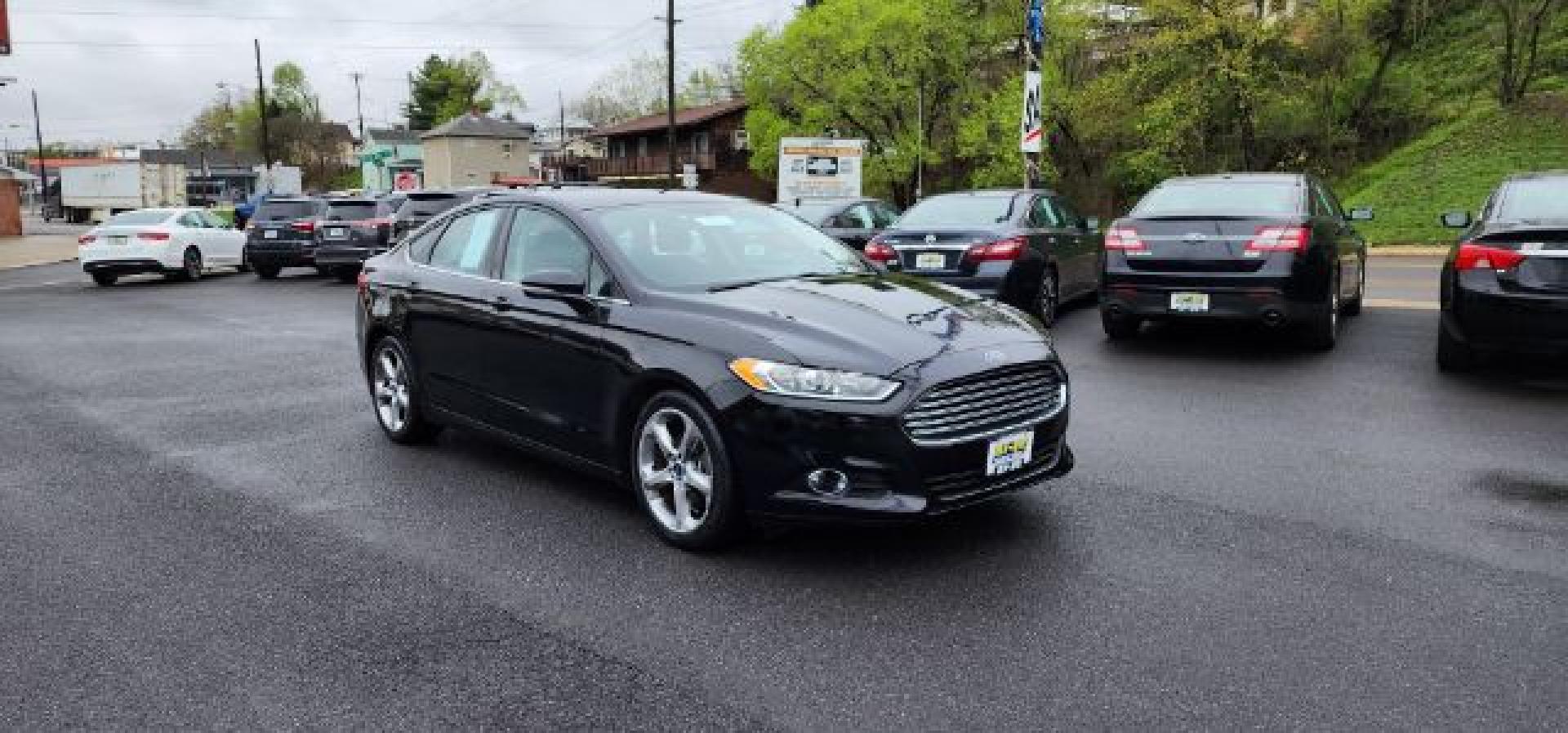 2015 BLACK /Charcoal Black Ford Fusion SE (3FA6P0H70FR) with an 2.5 L4 engine, AT transmission, located at 353 S. Mineral St., Keyser, WV, 26726, (304) 788-7887, 39.436451, -78.981674 - FOR A BETTER PRICE CALL PAUL AT 301-268-8150- Photo#0