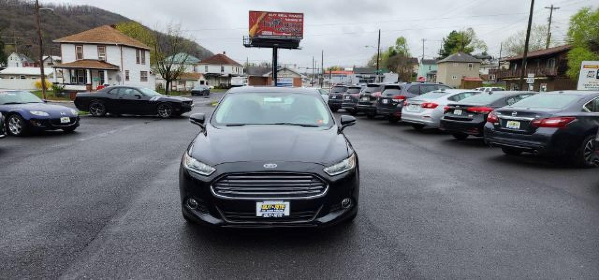 2015 BLACK /Charcoal Black Ford Fusion SE (3FA6P0H70FR) with an 2.5 L4 engine, AT transmission, located at 353 S. Mineral St., Keyser, WV, 26726, (304) 788-7887, 39.436451, -78.981674 - FOR A BETTER PRICE CALL PAUL AT 301-268-8150- Photo#1