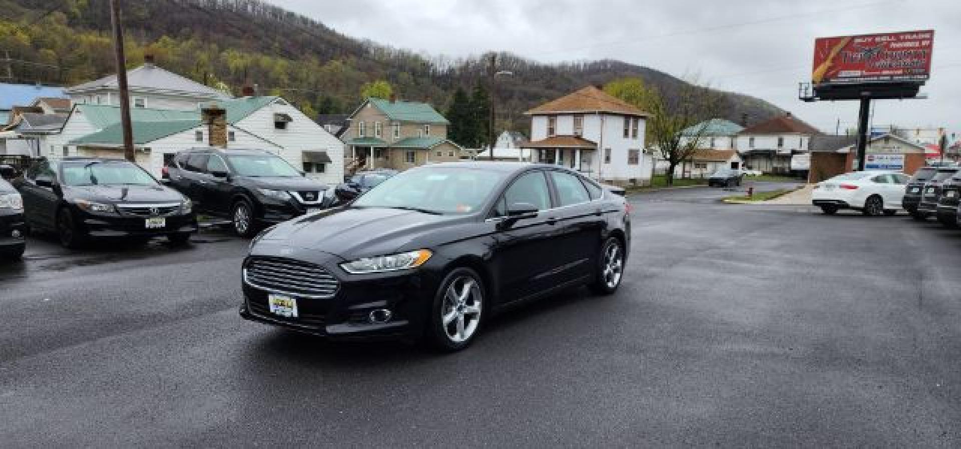 2015 BLACK /Charcoal Black Ford Fusion SE (3FA6P0H70FR) with an 2.5 L4 engine, AT transmission, located at 353 S. Mineral St., Keyser, WV, 26726, (304) 788-7887, 39.436451, -78.981674 - FOR A BETTER PRICE CALL PAUL AT 301-268-8150- Photo#2