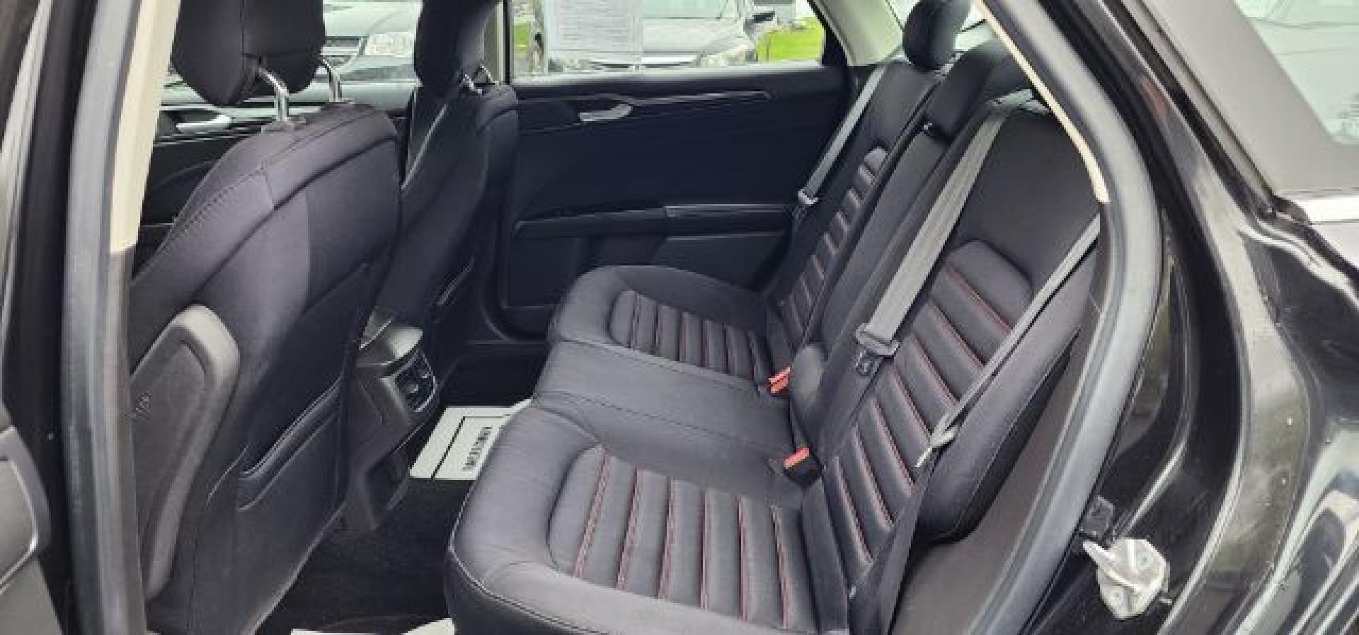 2015 BLACK /Charcoal Black Ford Fusion SE (3FA6P0H70FR) with an 2.5 L4 engine, AT transmission, located at 353 S. Mineral St., Keyser, WV, 26726, (304) 788-7887, 39.436451, -78.981674 - FOR A BETTER PRICE CALL PAUL AT 301-268-8150- Photo#7