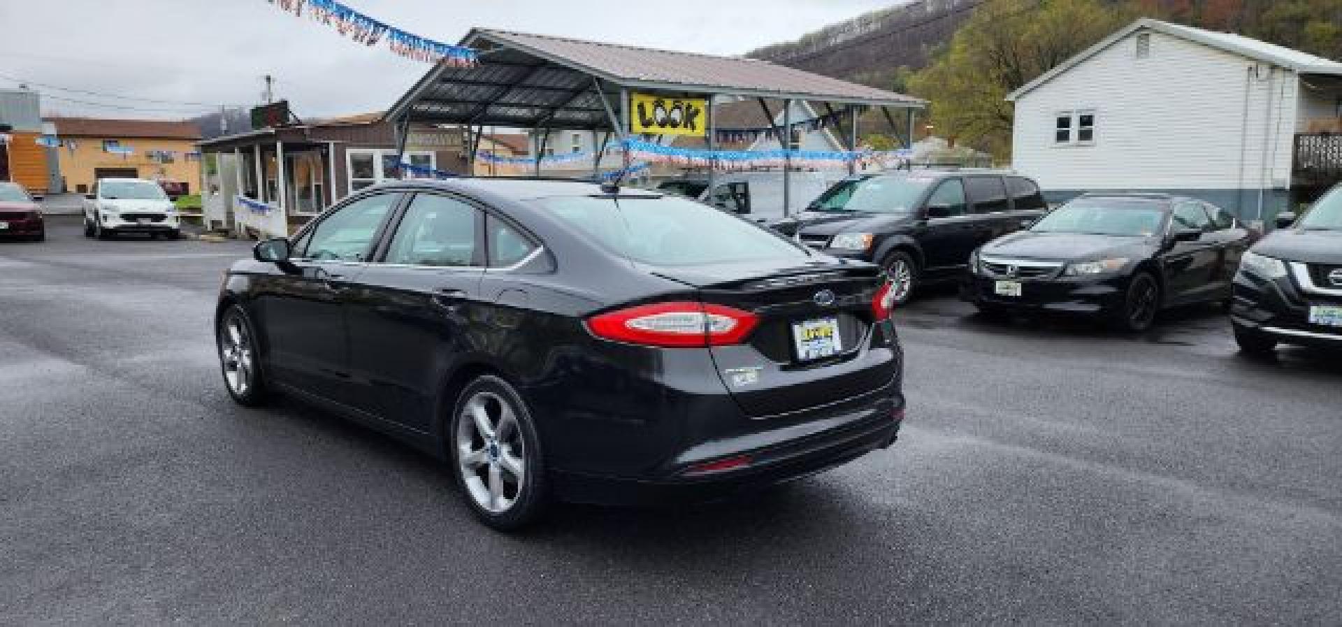 2015 BLACK /Charcoal Black Ford Fusion SE (3FA6P0H70FR) with an 2.5 L4 engine, AT transmission, located at 353 S. Mineral St., Keyser, WV, 26726, (304) 788-7887, 39.436451, -78.981674 - FOR A BETTER PRICE CALL PAUL AT 301-268-8150- Photo#8