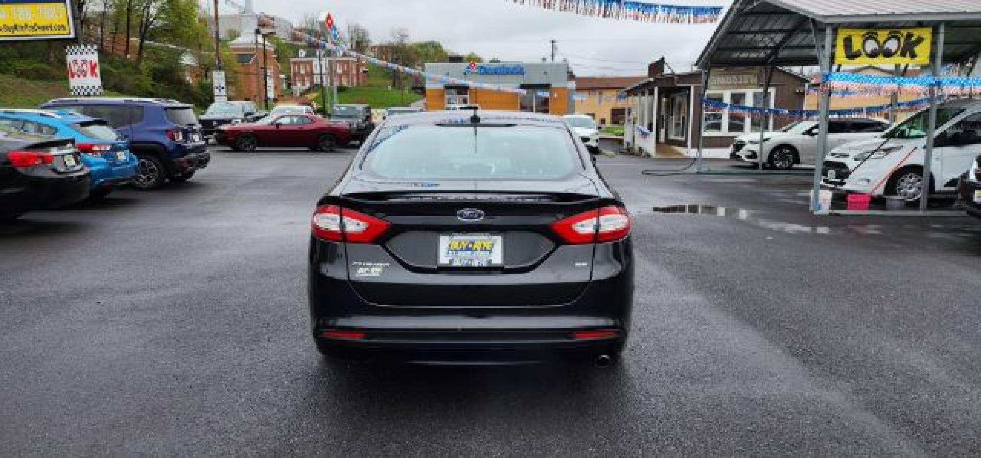 2015 BLACK /Charcoal Black Ford Fusion SE (3FA6P0H70FR) with an 2.5 L4 engine, AT transmission, located at 353 S. Mineral St., Keyser, WV, 26726, (304) 788-7887, 39.436451, -78.981674 - FOR A BETTER PRICE CALL PAUL AT 301-268-8150- Photo#9