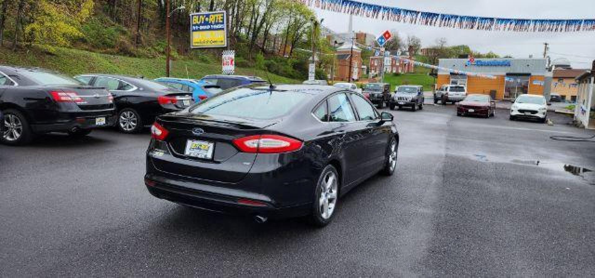 2015 BLACK /Charcoal Black Ford Fusion SE (3FA6P0H70FR) with an 2.5 L4 engine, AT transmission, located at 353 S. Mineral St., Keyser, WV, 26726, (304) 788-7887, 39.436451, -78.981674 - FOR A BETTER PRICE CALL PAUL AT 301-268-8150 - Photo#11