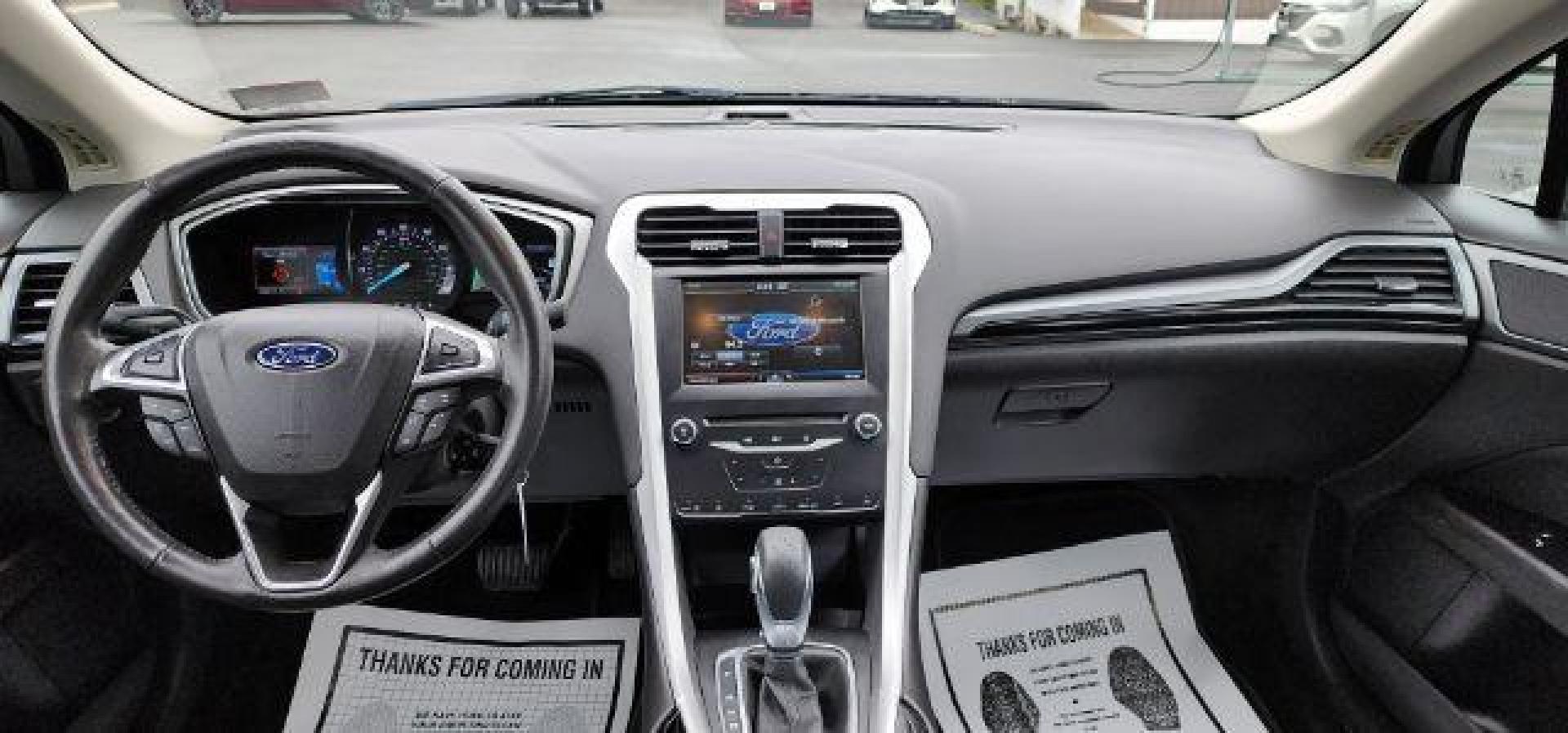 2015 BLACK /Charcoal Black Ford Fusion SE (3FA6P0H70FR) with an 2.5 L4 engine, AT transmission, located at 353 S. Mineral St., Keyser, WV, 26726, (304) 788-7887, 39.436451, -78.981674 - FOR A BETTER PRICE CALL PAUL AT 301-268-8150 - Photo#6