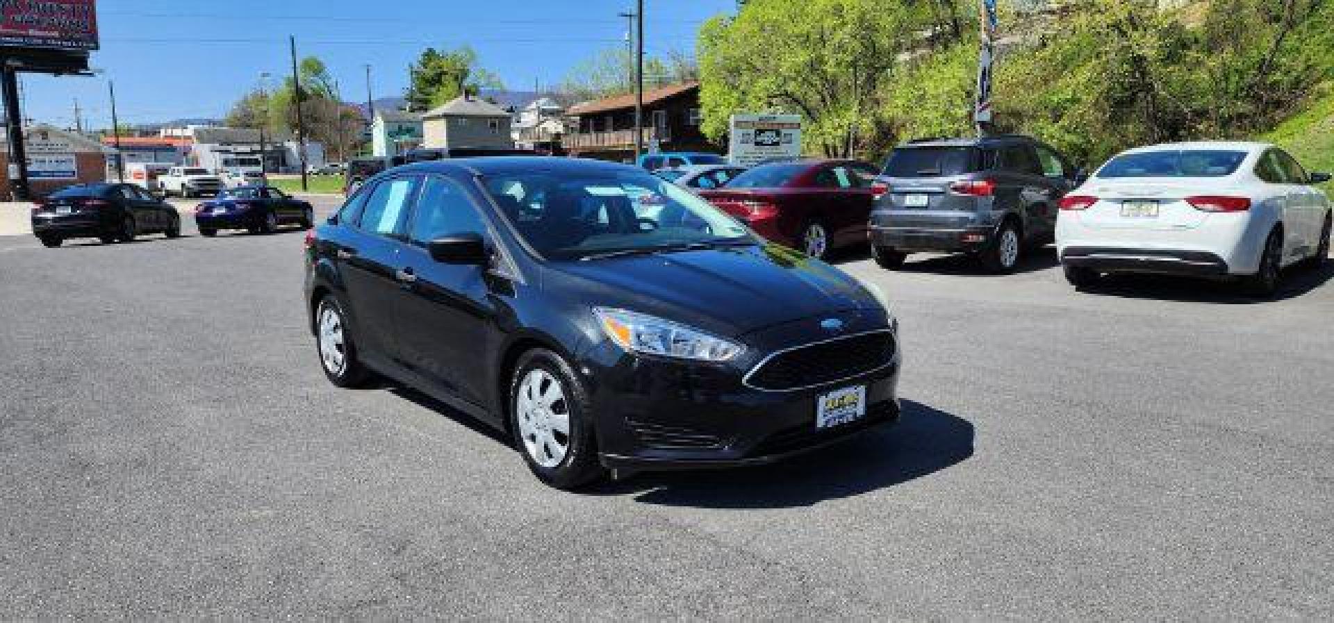 2015 BLACK /Charcoal Black Insert w/Warm Steel Surround, cloth Ford Focus S Sedan (1FADP3E26FL) with an 2.0l L4 engine, AT transmission, located at 353 S. Mineral St., Keyser, WV, 26726, (304) 788-7887, 39.436451, -78.981674 - Photo#0