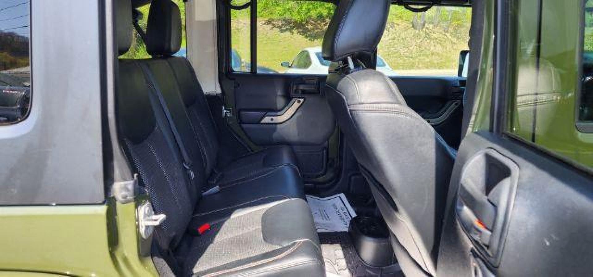 2016 GREEN /Leather Black Jeep Wrangler Unlimited Sahara 4WD (1C4BJWEG8GL) with an 3.6L V6 engine, AT transmission, located at 353 S. Mineral St., Keyser, WV, 26726, (304) 788-7887, 39.436451, -78.981674 - Photo#13