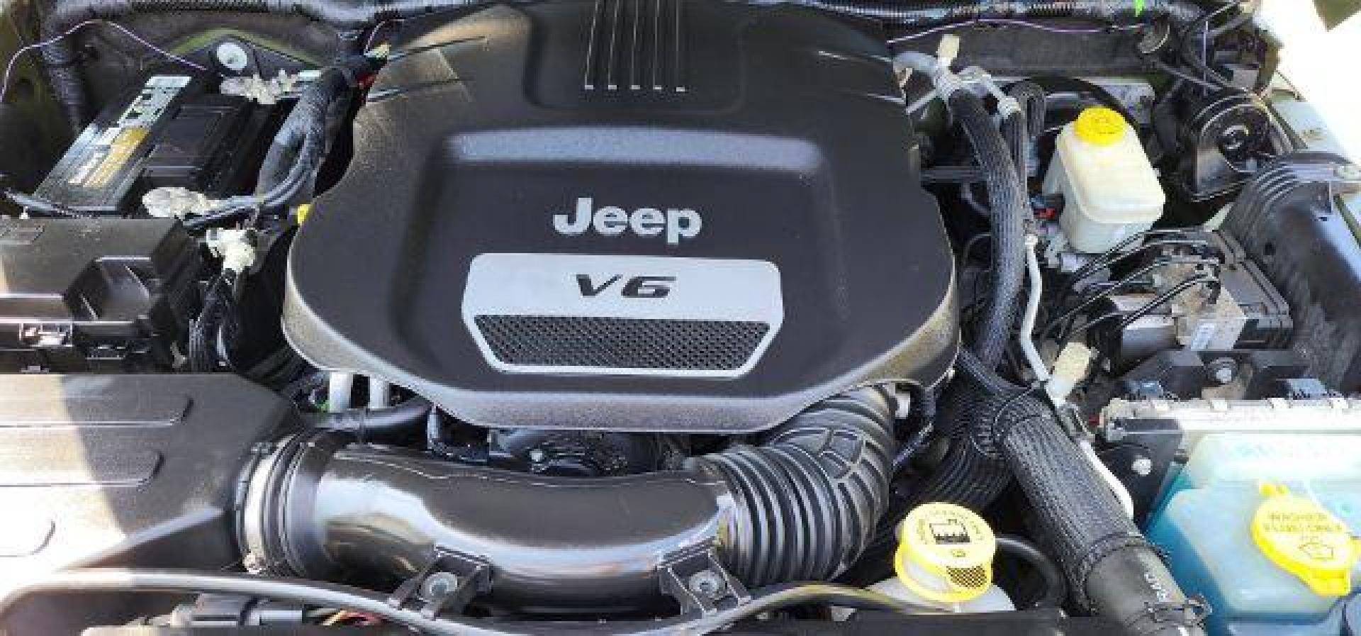 2016 GREEN /Leather Black Jeep Wrangler Unlimited Sahara 4WD (1C4BJWEG8GL) with an 3.6L V6 engine, AT transmission, located at 353 S. Mineral St., Keyser, WV, 26726, (304) 788-7887, 39.436451, -78.981674 - Photo#15