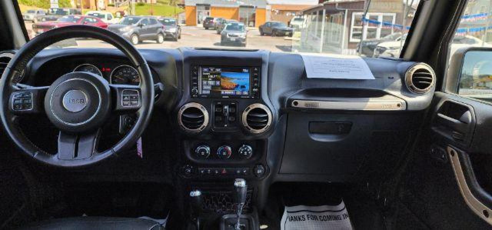 2016 GREEN /Leather Black Jeep Wrangler Unlimited Sahara 4WD (1C4BJWEG8GL) with an 3.6L V6 engine, AT transmission, located at 353 S. Mineral St., Keyser, WV, 26726, (304) 788-7887, 39.436451, -78.981674 - Photo#6