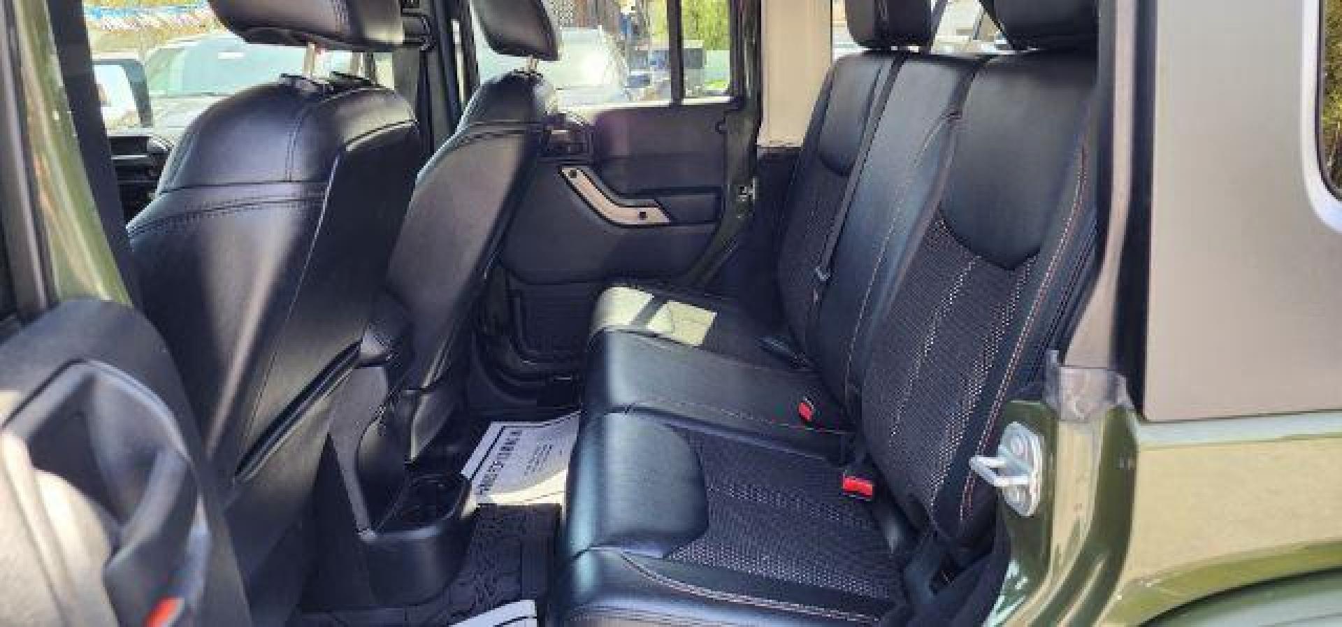 2016 GREEN /Leather Black Jeep Wrangler Unlimited Sahara 4WD (1C4BJWEG8GL) with an 3.6L V6 engine, AT transmission, located at 353 S. Mineral St., Keyser, WV, 26726, (304) 788-7887, 39.436451, -78.981674 - Photo#7