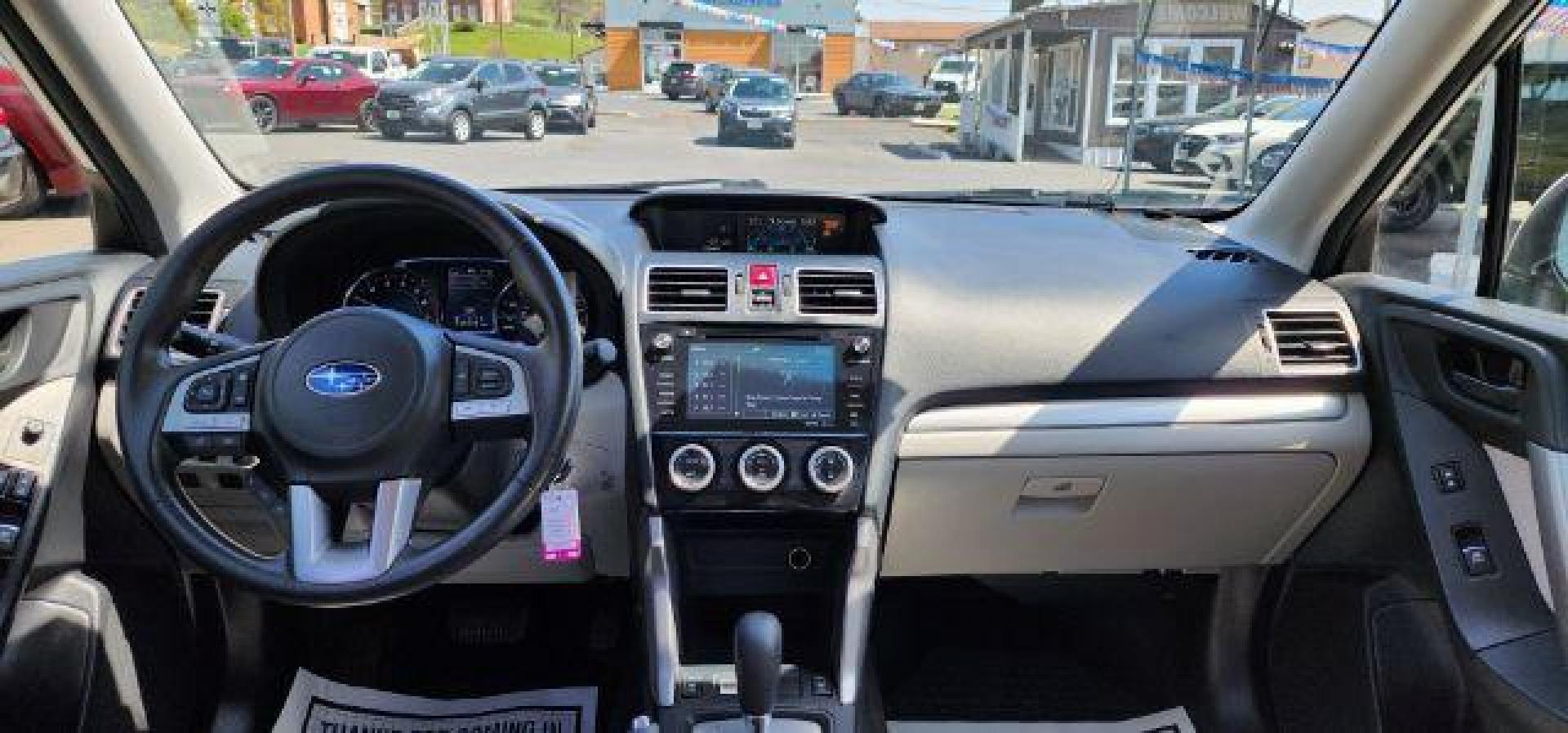 2018 WHITE /Gray Subaru Forester 2.5i Premium (JF2SJAGC2JH) with an 2.5 L4 engine, AT transmission, located at 353 S. Mineral St., Keyser, WV, 26726, (304) 788-7887, 39.436451, -78.981674 - FOR A BETTER PRICE CALL PAUL AT 301-268-8150 - Photo#6