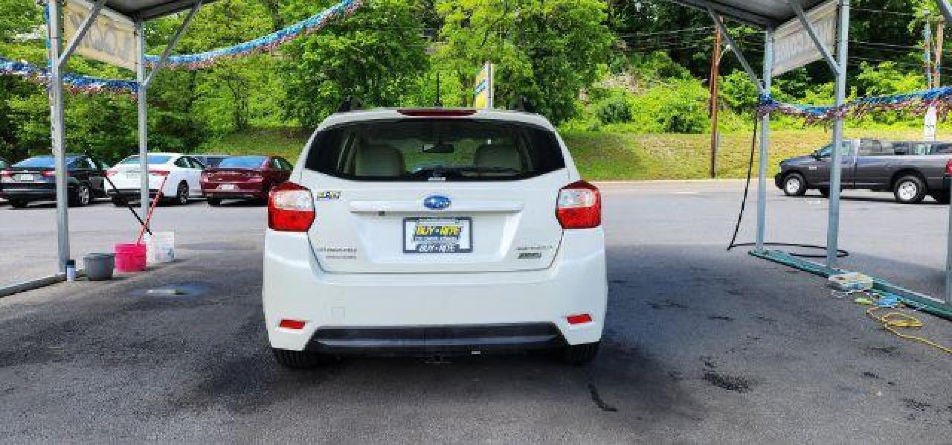 2015 WHITE /Ivory, cloth Subaru Impreza 2.0i Sport Premium PZEV CVT 5-Door (JF1GPAT67F8) with an 2.0L L4 engine, CVT transmission, located at 353 S. Mineral St., Keyser, WV, 26726, (304) 788-7887, 39.436451, -78.981674 - FOR A BETTER PRICE CALL PAUL AT 301-268-8150 - Photo#9