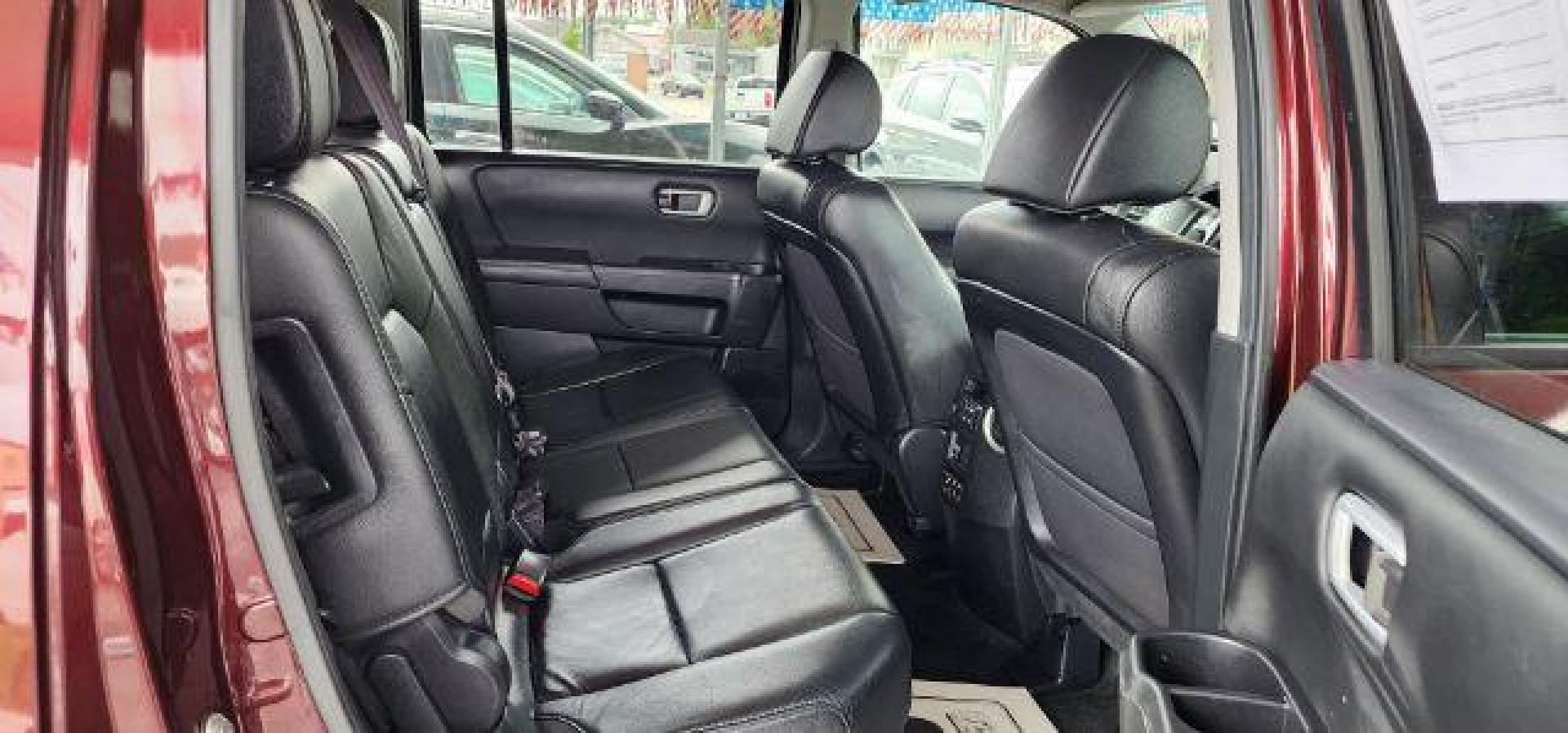 2013 BURGUNDY /Black Honda Pilot EX-L (5FNYF4H63DB) with an 3.5L V6 engine, AT transmission, located at 353 S. Mineral St., Keyser, WV, 26726, (304) 788-7887, 39.436451, -78.981674 - FOR A BETTER PRICE CALL PAUL AT 301-268-8150 - Photo#16