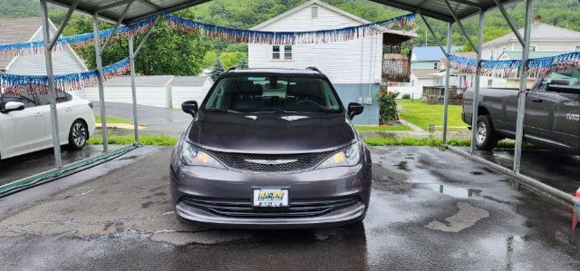 2020 GRAY /Alloy/Black Chrysler Voyager LXI (2C4RC1DG9LR) with an 3.6L V6 engine, AT transmission, located at 353 S. Mineral St., Keyser, WV, 26726, (304) 788-7887, 39.436451, -78.981674 - Photo#1