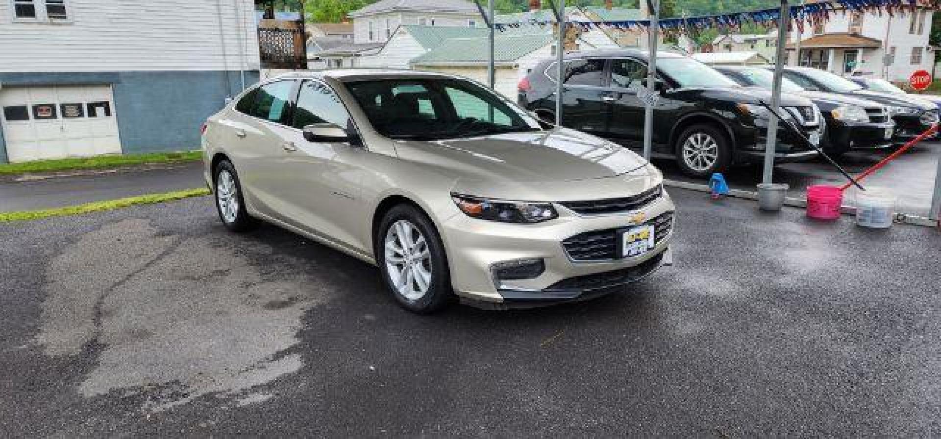 2016 BEIGE /Jet Black Chevrolet Malibu 1LT (1G1ZE5ST9GF) with an 1.5L L4 engine, AT transmission, located at 353 S. Mineral St., Keyser, WV, 26726, (304) 788-7887, 39.436451, -78.981674 - Photo#0