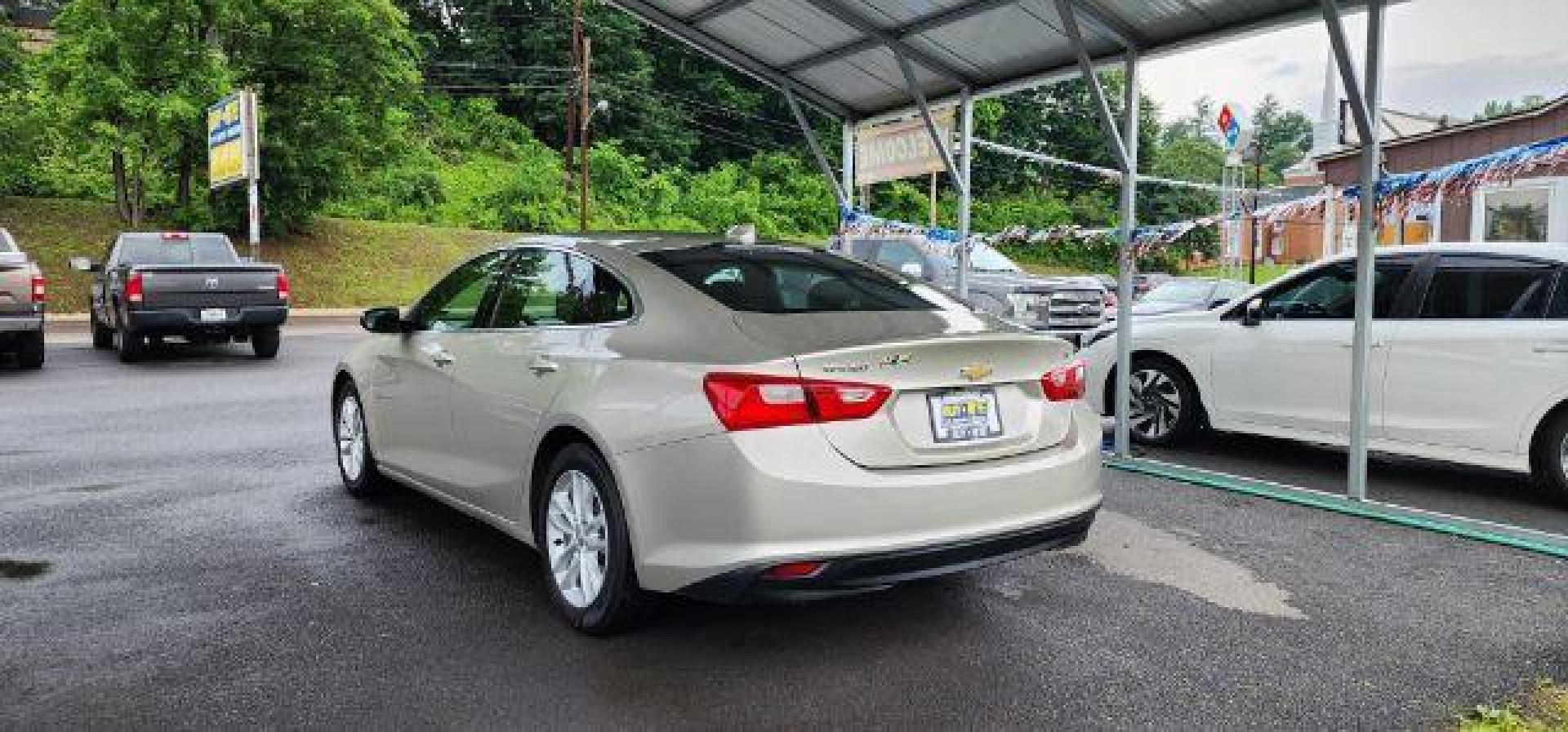 2016 BEIGE /Jet Black Chevrolet Malibu 1LT (1G1ZE5ST9GF) with an 1.5L L4 engine, AT transmission, located at 353 S. Mineral St., Keyser, WV, 26726, (304) 788-7887, 39.436451, -78.981674 - Photo#8