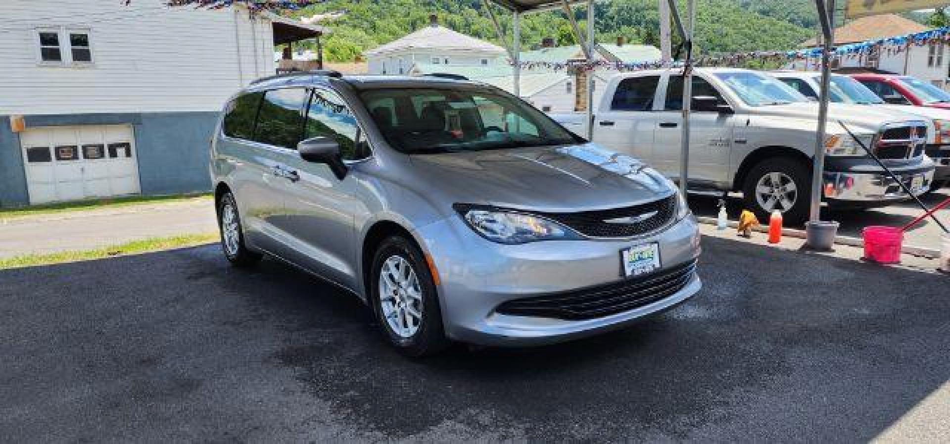2020 SILVER /Alloy/Black Chrysler Voyager LXI (2C4RC1DG0LR) with an 3.6L V6 engine, AT transmission, located at 353 S. Mineral St., Keyser, WV, 26726, (304) 788-7887, 39.436451, -78.981674 - Photo#0