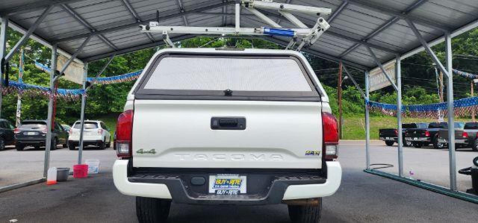 2019 WHITE /Cement Gray Toyota Tacoma SR (5TFSX5EN3KX) with an 2.7 L4 engine, AT transmission, located at 353 S. Mineral St., Keyser, WV, 26726, (304) 788-7887, 39.436451, -78.981674 - Photo#9