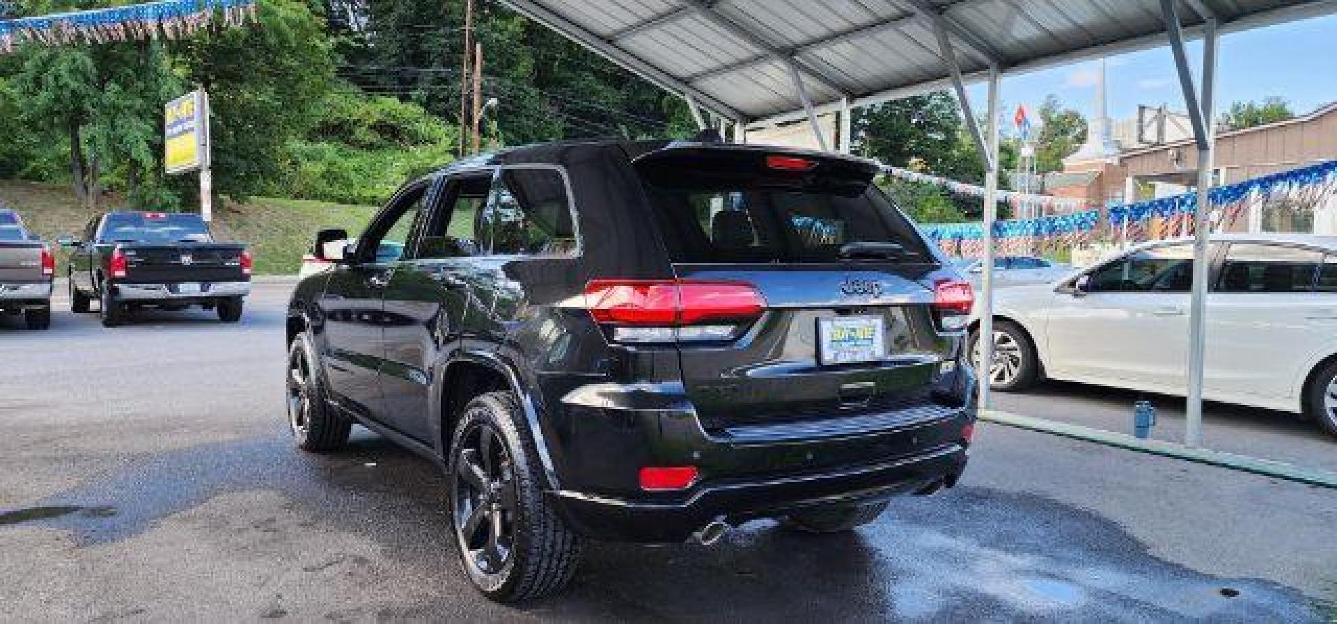 2015 BLACK /Black Jeep Grand Cherokee Altitude (1C4RJFAG4FC) with an 3.6L V6 engine, AT transmission, located at 353 S. Mineral St., Keyser, WV, 26726, (304) 788-7887, 39.436451, -78.981674 - Photo#8