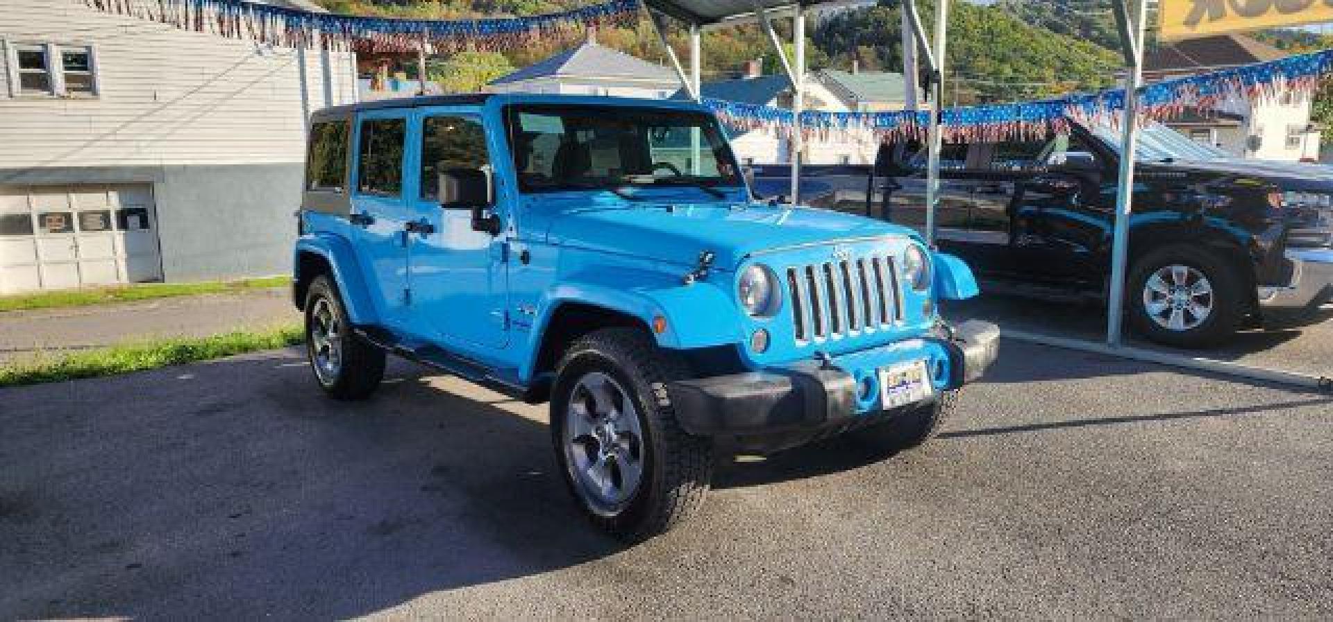 2018 BLUE /Cloth JEEP WRANGLER Unlimited Sahara 4 Door (1C4BJWEG2JL) with an 3.6L V6 engine, AT transmission, located at 353 S. Mineral St., Keyser, WV, 26726, (304) 788-7887, 39.436451, -78.981674 - Photo#0