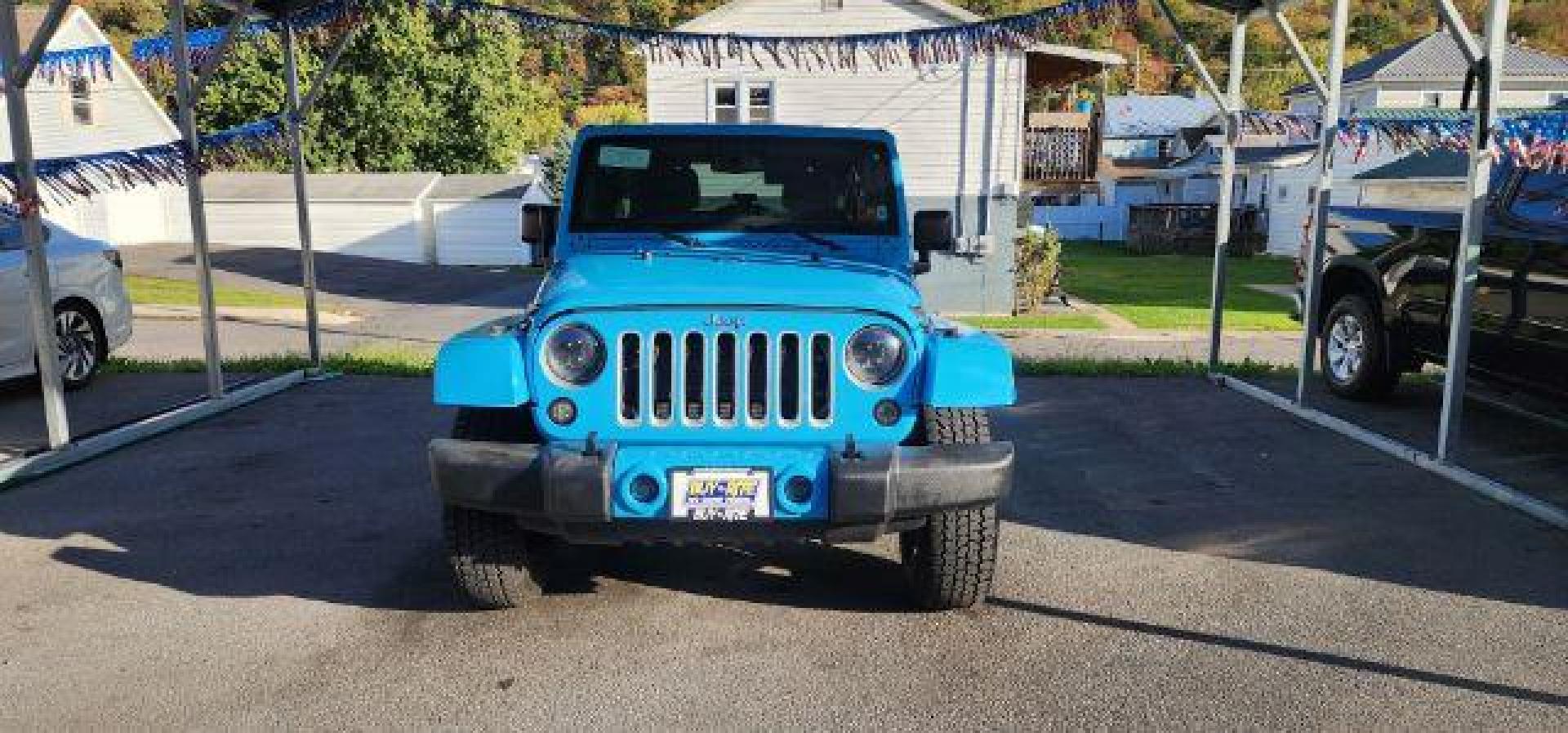 2018 BLUE /Cloth JEEP WRANGLER Unlimited Sahara 4 Door (1C4BJWEG2JL) with an 3.6L V6 engine, AT transmission, located at 353 S. Mineral St., Keyser, WV, 26726, (304) 788-7887, 39.436451, -78.981674 - Photo#1