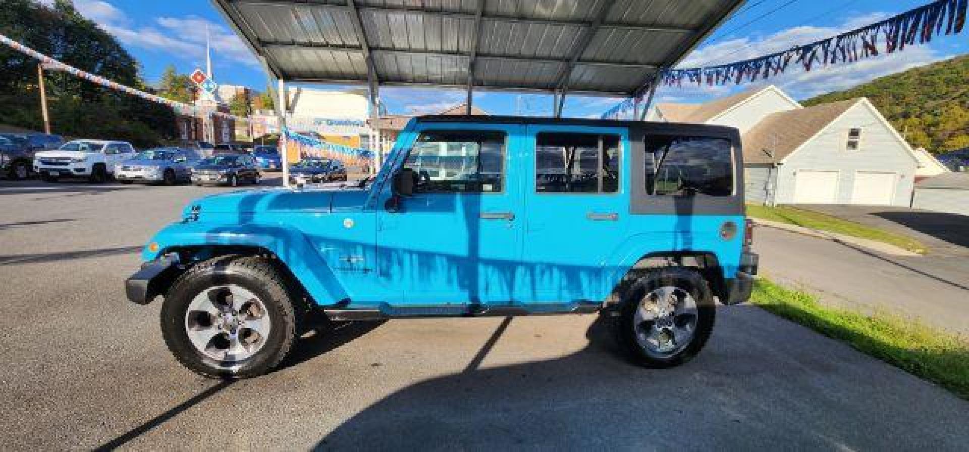 2018 BLUE /Cloth JEEP WRANGLER Unlimited Sahara 4 Door (1C4BJWEG2JL) with an 3.6L V6 engine, AT transmission, located at 353 S. Mineral St., Keyser, WV, 26726, (304) 788-7887, 39.436451, -78.981674 - Photo#3