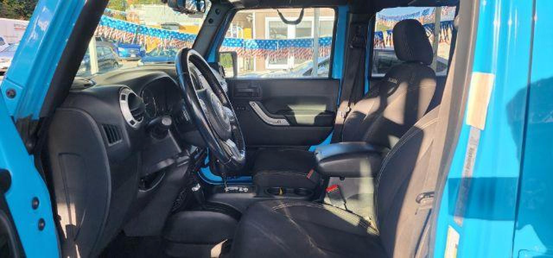 2018 BLUE /Cloth JEEP WRANGLER Unlimited Sahara 4 Door (1C4BJWEG2JL) with an 3.6L V6 engine, AT transmission, located at 353 S. Mineral St., Keyser, WV, 26726, (304) 788-7887, 39.436451, -78.981674 - Photo#4