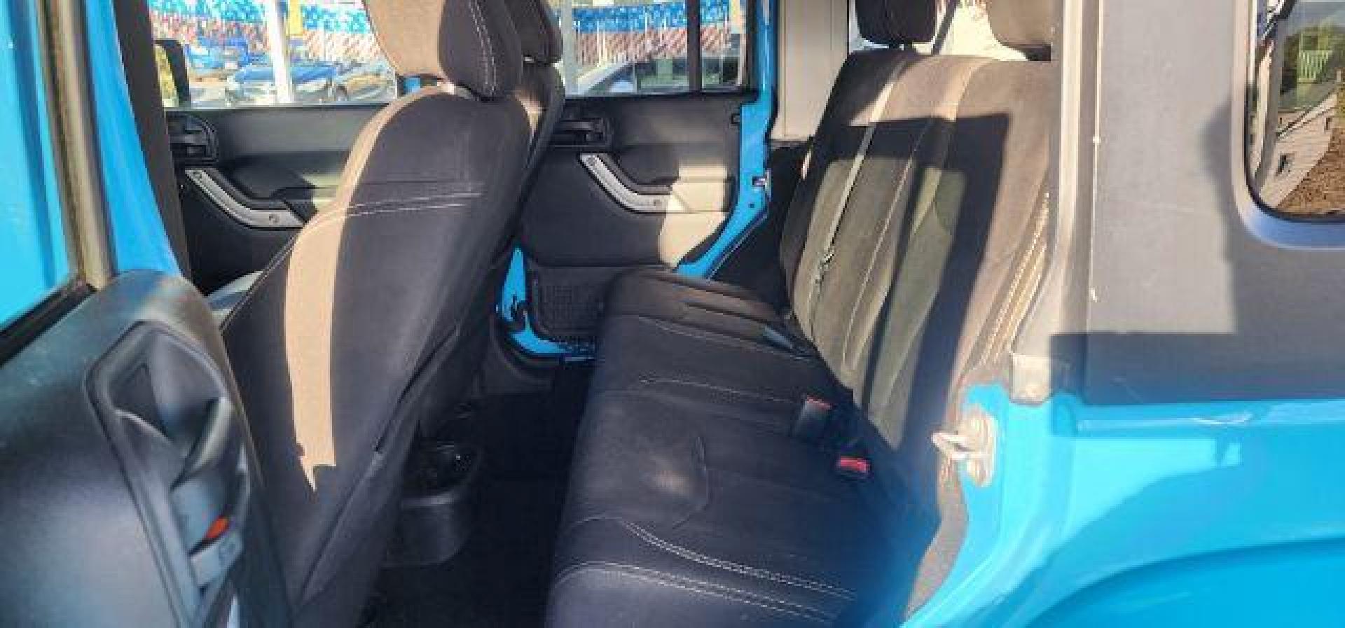 2018 BLUE /Cloth JEEP WRANGLER Unlimited Sahara 4 Door (1C4BJWEG2JL) with an 3.6L V6 engine, AT transmission, located at 353 S. Mineral St., Keyser, WV, 26726, (304) 788-7887, 39.436451, -78.981674 - Photo#7