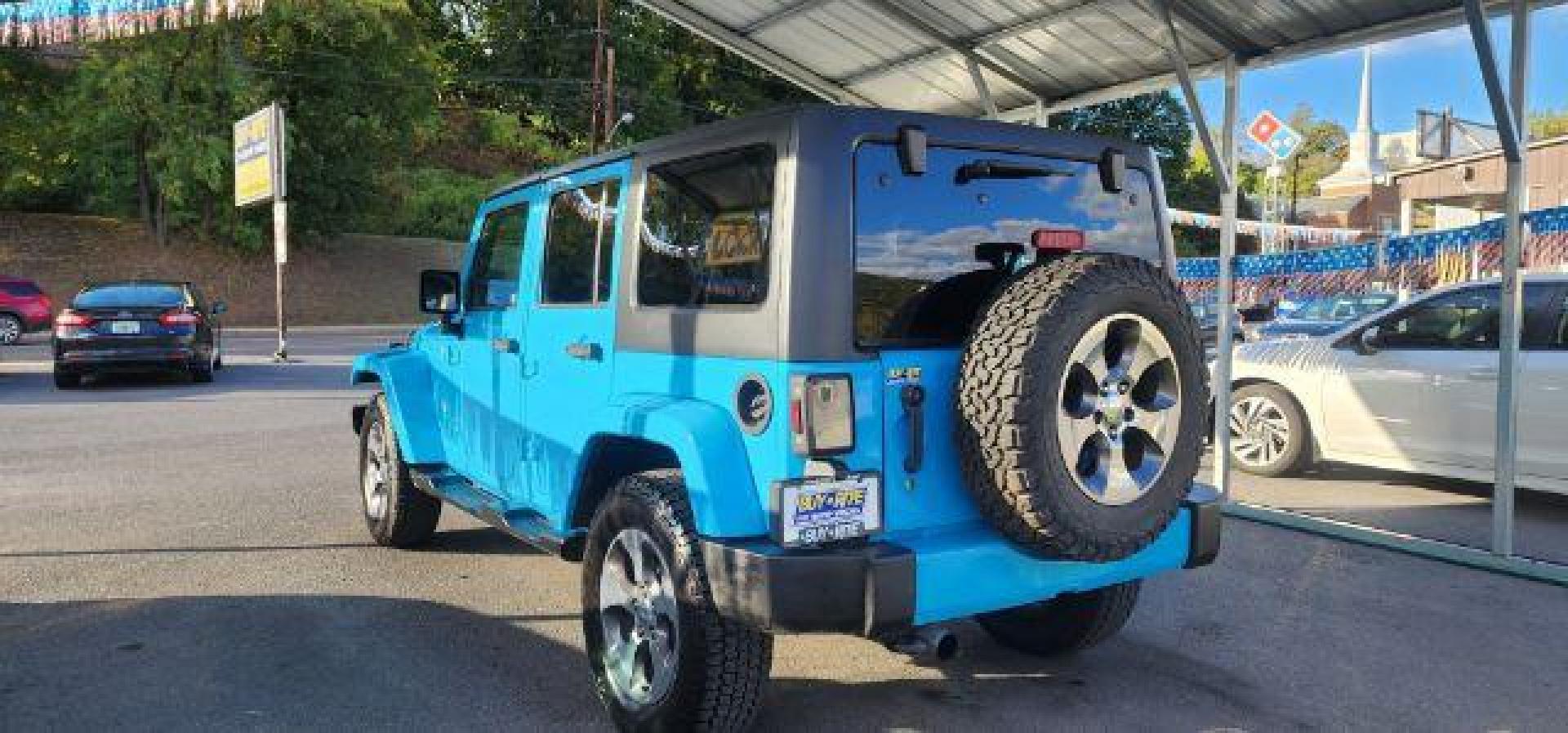 2018 BLUE /Cloth JEEP WRANGLER Unlimited Sahara 4 Door (1C4BJWEG2JL) with an 3.6L V6 engine, AT transmission, located at 353 S. Mineral St., Keyser, WV, 26726, (304) 788-7887, 39.436451, -78.981674 - Photo#8