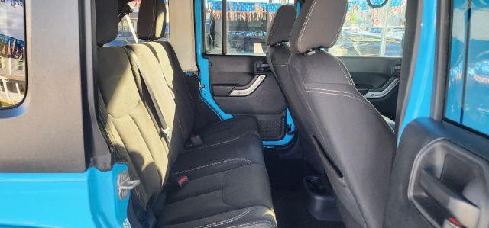 2018 BLUE /Cloth JEEP WRANGLER Unlimited Sahara 4 Door (1C4BJWEG2JL) with an 3.6L V6 engine, AT transmission, located at 353 S. Mineral St., Keyser, WV, 26726, (304) 788-7887, 39.436451, -78.981674 - Photo#13