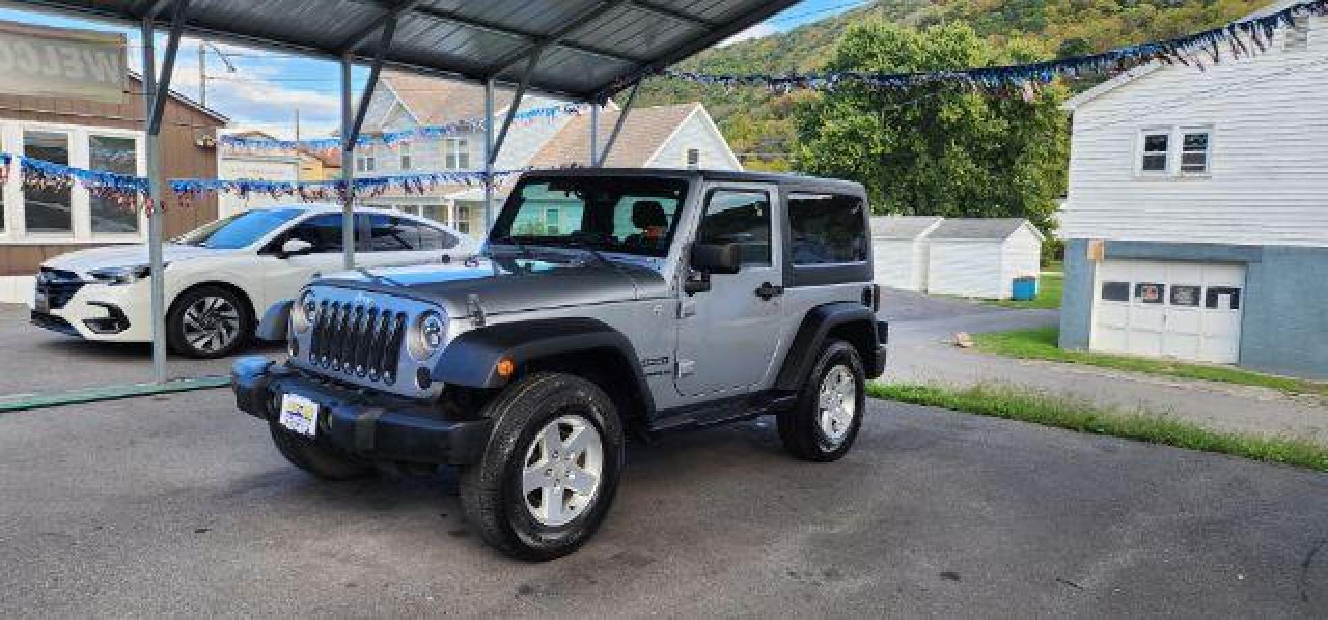 2014 Silver /Black Jeep Wrangler Sport (1C4AJWAGXEL) with an 3.6L V6 engine, AT transmission, located at 353 S. Mineral St., Keyser, WV, 26726, (304) 788-7887, 39.436451, -78.981674 - Photo#2