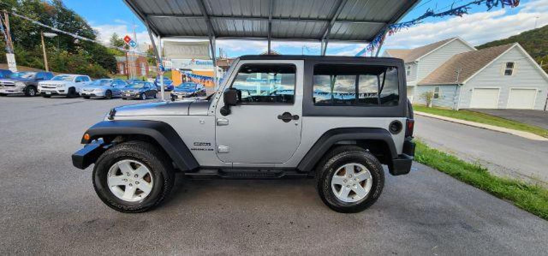 2014 Silver /Black Jeep Wrangler Sport (1C4AJWAGXEL) with an 3.6L V6 engine, AT transmission, located at 353 S. Mineral St., Keyser, WV, 26726, (304) 788-7887, 39.436451, -78.981674 - Photo#3