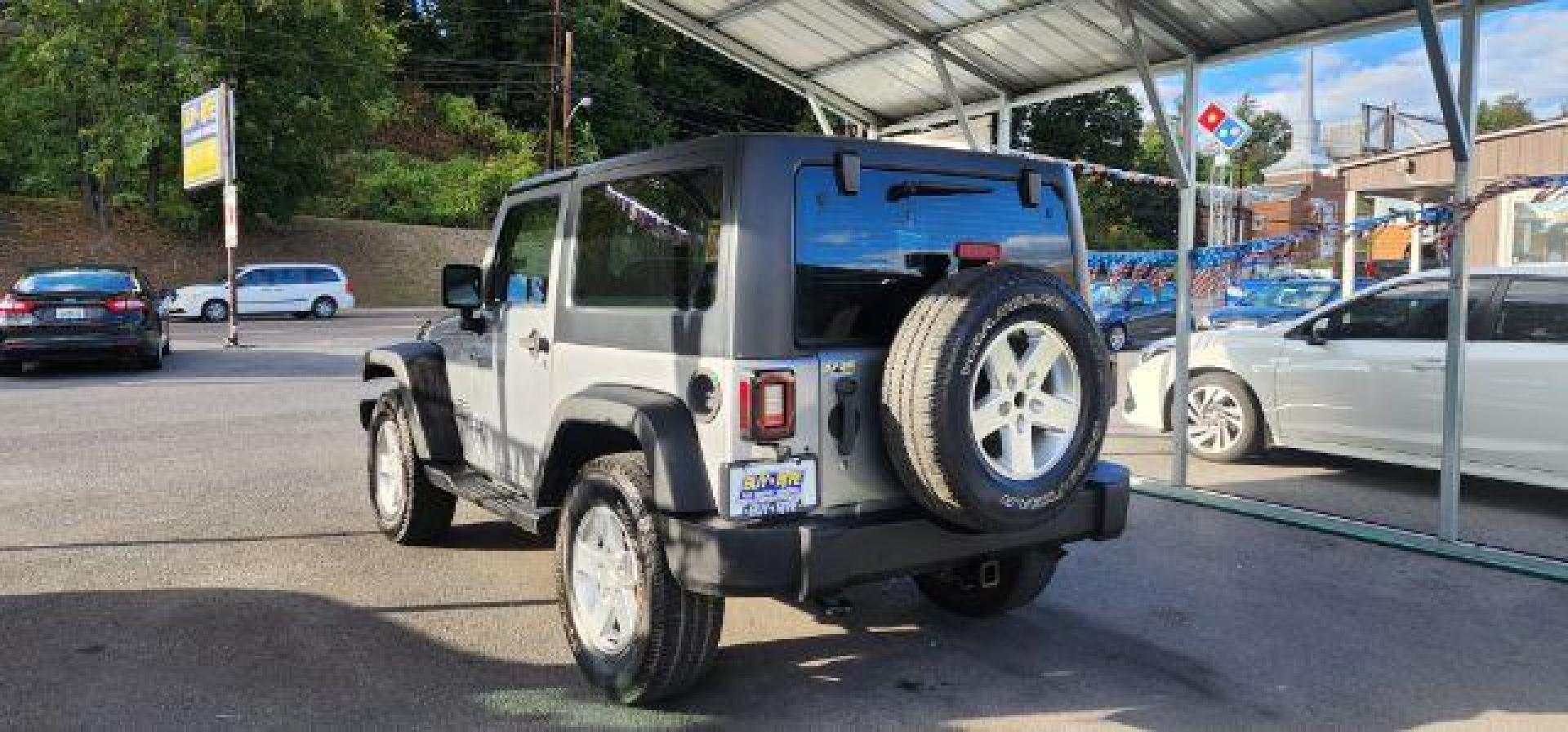 2014 Silver /Black Jeep Wrangler Sport (1C4AJWAGXEL) with an 3.6L V6 engine, AT transmission, located at 353 S. Mineral St., Keyser, WV, 26726, (304) 788-7887, 39.436451, -78.981674 - Photo#8