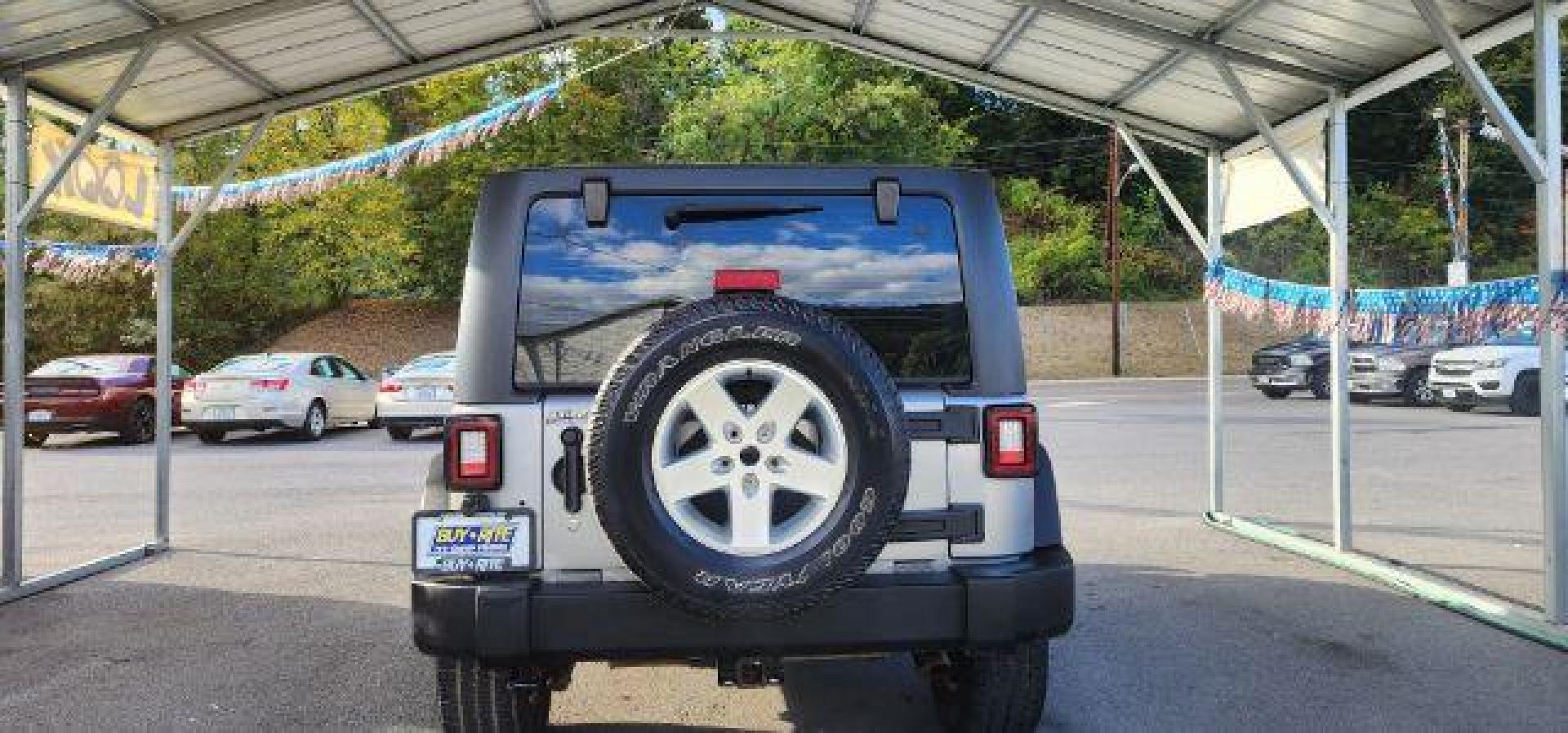 2014 Silver /Black Jeep Wrangler Sport (1C4AJWAGXEL) with an 3.6L V6 engine, AT transmission, located at 353 S. Mineral St., Keyser, WV, 26726, (304) 788-7887, 39.436451, -78.981674 - Photo#9