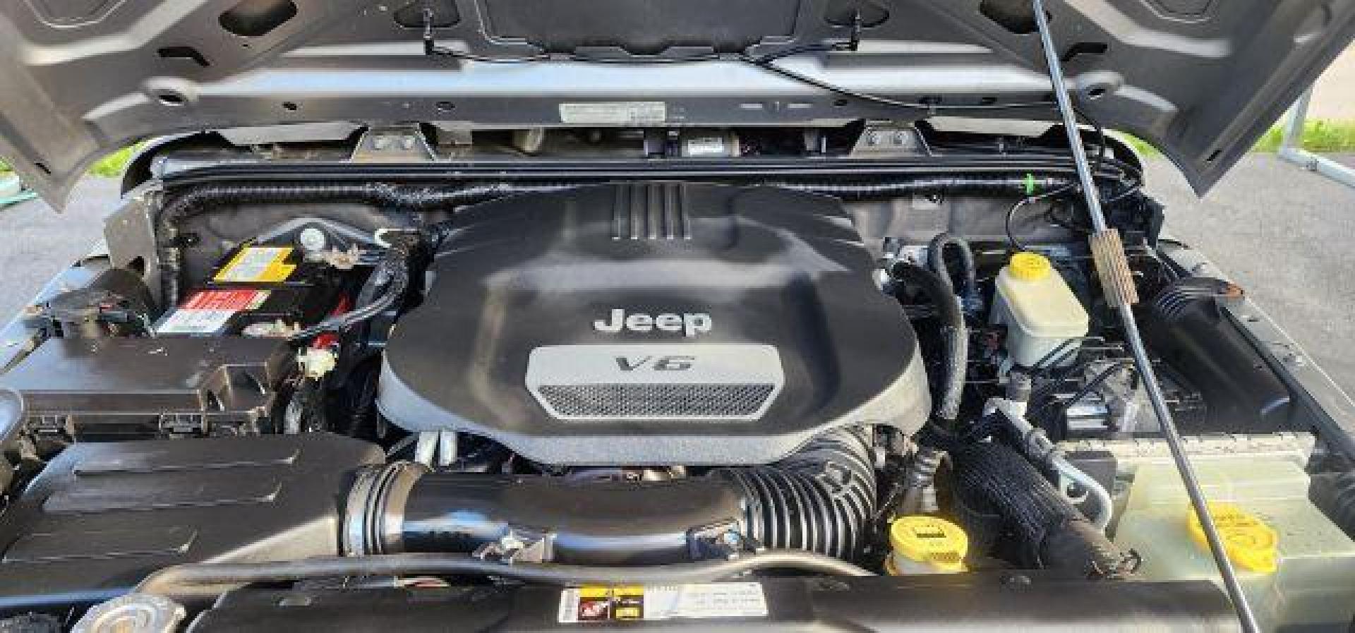 2014 Silver /Black Jeep Wrangler Sport (1C4AJWAGXEL) with an 3.6L V6 engine, AT transmission, located at 353 S. Mineral St., Keyser, WV, 26726, (304) 788-7887, 39.436451, -78.981674 - Photo#14