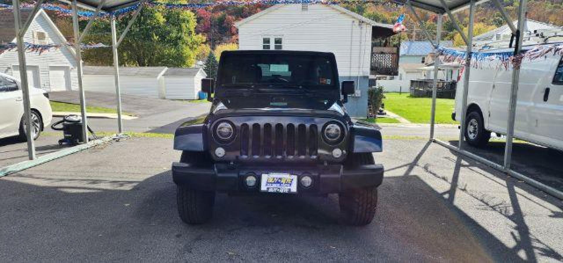 2017 GRAY /Black Jeep Wrangler Unlimited Sahara 4x4 (1C4BJWEG8HL) with an 3.6L V6 engine, 6 Speed transmission, located at 353 S. Mineral St., Keyser, WV, 26726, (304) 788-7887, 39.436451, -78.981674 - Photo#1