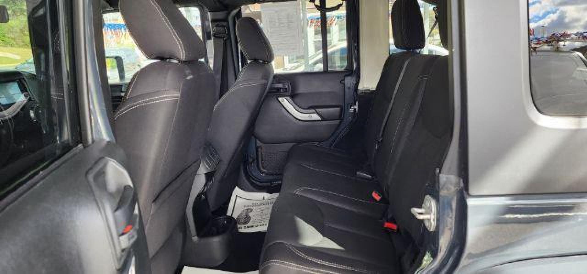 2017 GRAY /Black Jeep Wrangler Unlimited Sahara 4x4 (1C4BJWEG8HL) with an 3.6L V6 engine, 6 Speed transmission, located at 353 S. Mineral St., Keyser, WV, 26726, (304) 788-7887, 39.436451, -78.981674 - Photo#7