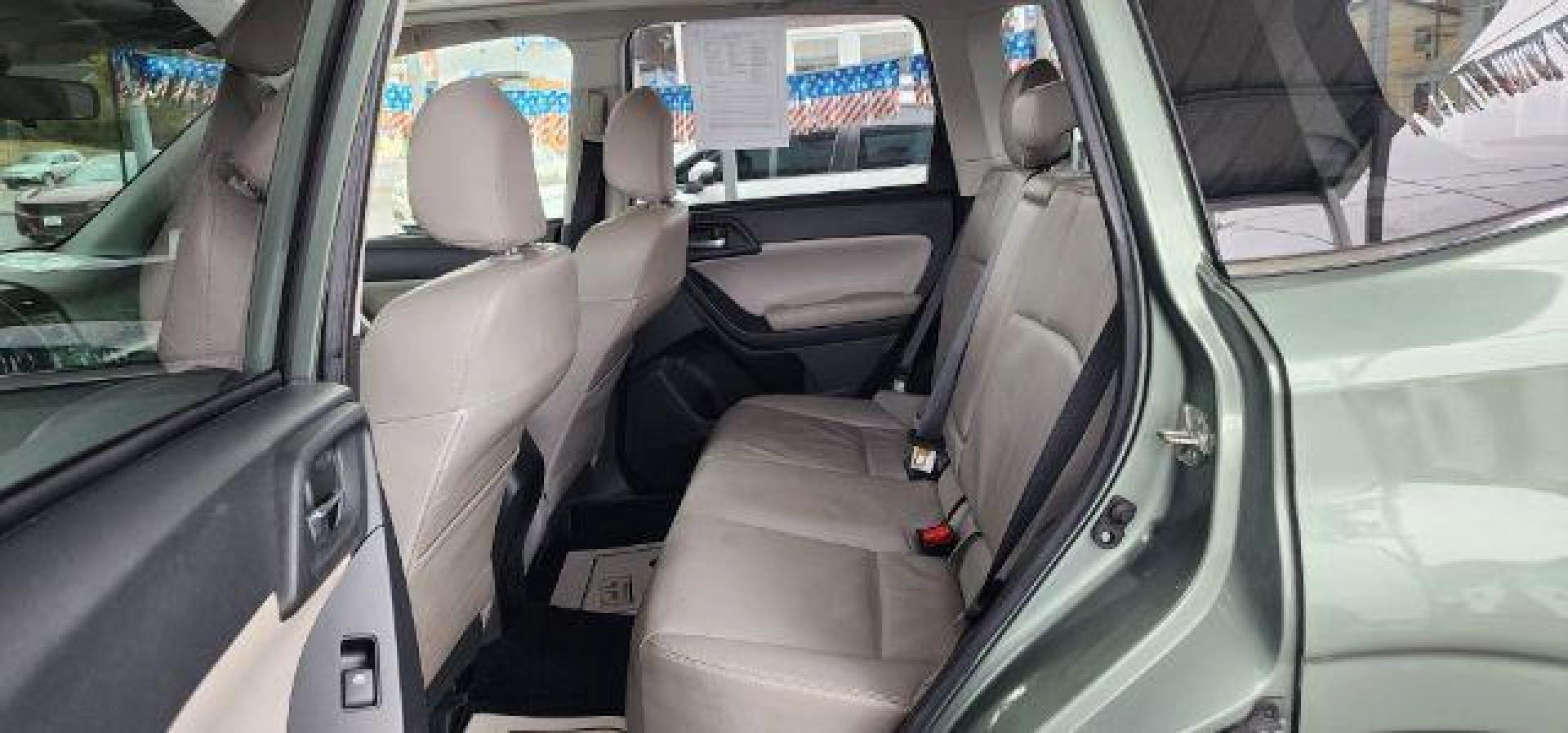 2014 GREEN /Gray Subaru Forester 2.5i Limited (JF2SJAHC9EH) with an 2.5 L4 engine, CVT transmission, located at 353 S. Mineral St., Keyser, WV, 26726, (304) 788-7887, 39.436451, -78.981674 - Photo#7