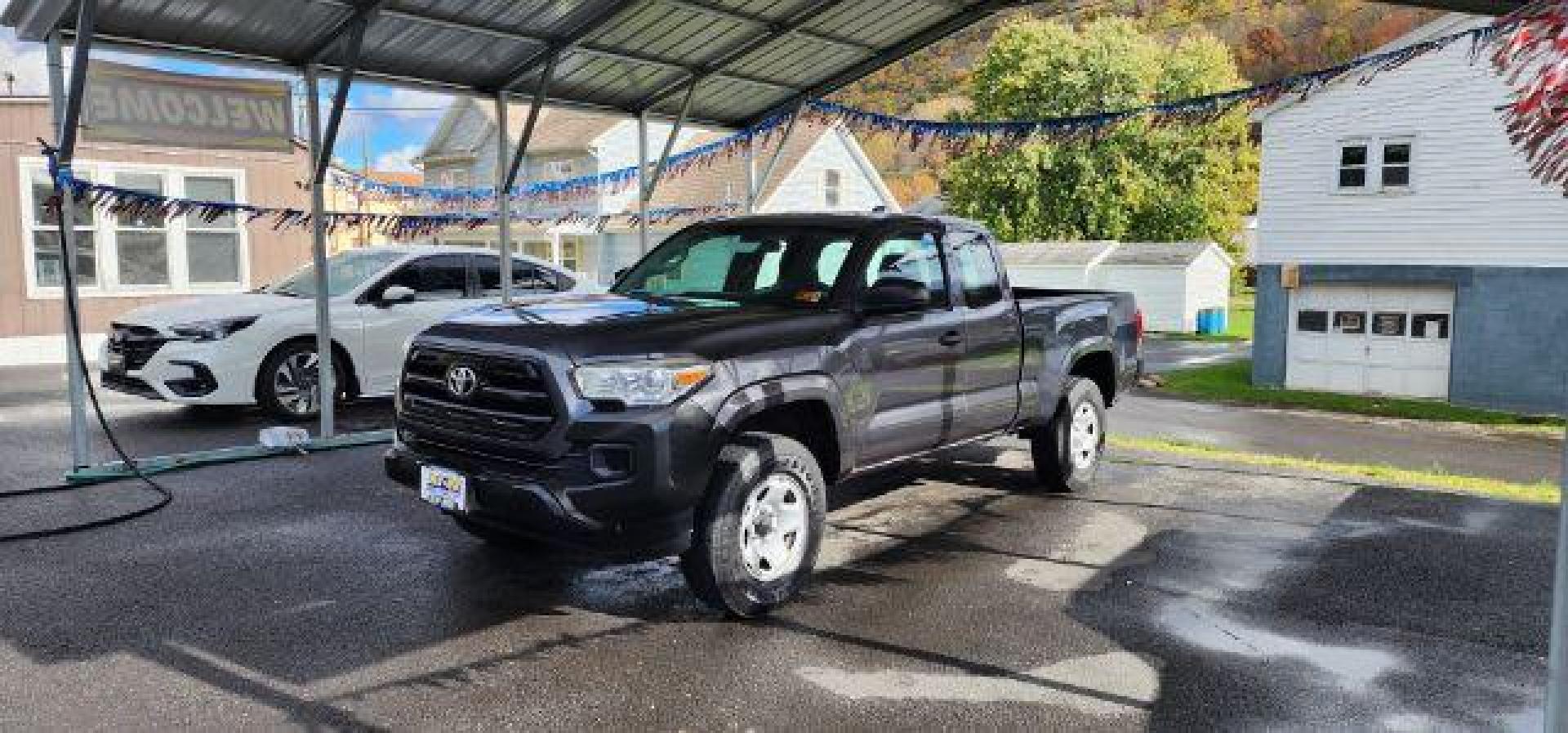 2016 GRAY /Cement Gray Toyota Tacoma SR Access Cab 4x4 (5TFSX5ENXGX) with an 2.7 L4 engine, AT transmission, located at 353 S. Mineral St., Keyser, WV, 26726, (304) 788-7887, 39.436451, -78.981674 - Photo#2