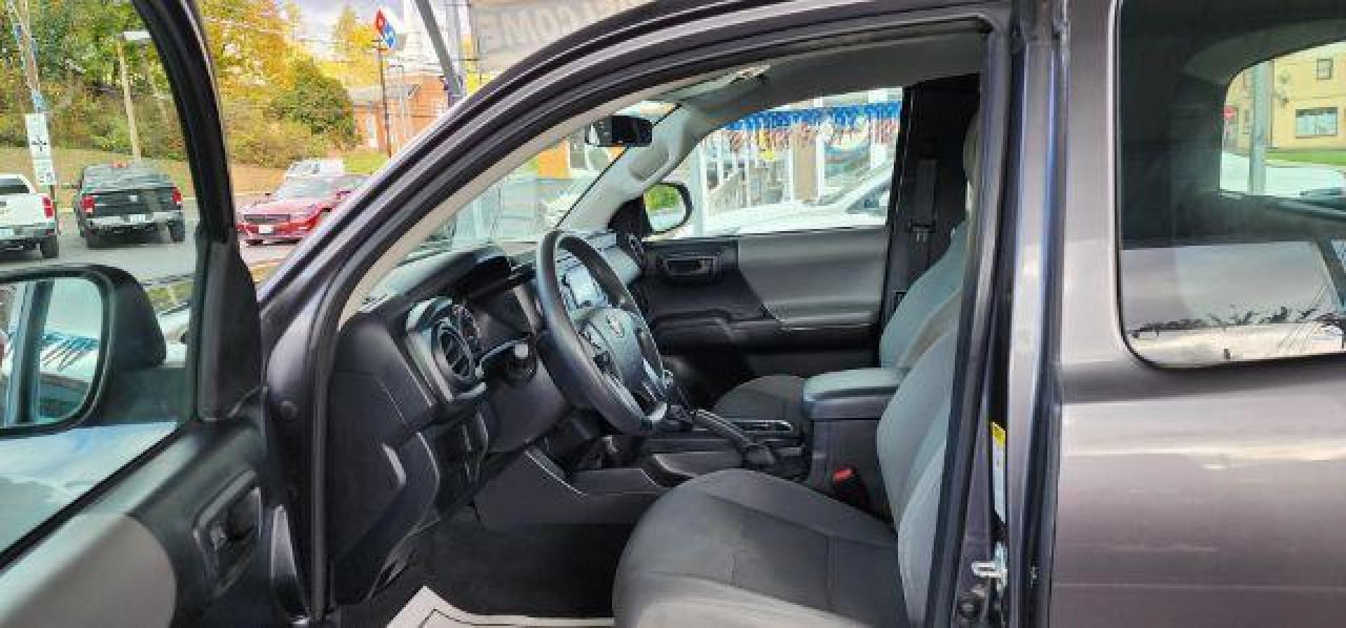 2016 GRAY /Cement Gray Toyota Tacoma SR Access Cab 4x4 (5TFSX5ENXGX) with an 2.7 L4 engine, AT transmission, located at 353 S. Mineral St., Keyser, WV, 26726, (304) 788-7887, 39.436451, -78.981674 - Photo#4