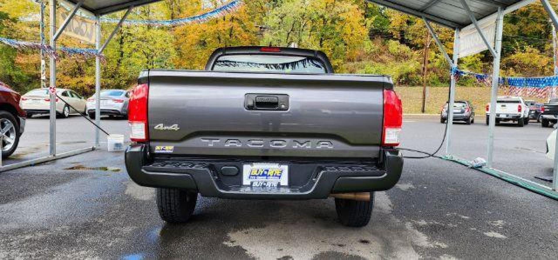2016 GRAY /Cement Gray Toyota Tacoma SR Access Cab 4x4 (5TFSX5ENXGX) with an 2.7 L4 engine, AT transmission, located at 353 S. Mineral St., Keyser, WV, 26726, (304) 788-7887, 39.436451, -78.981674 - Photo#9