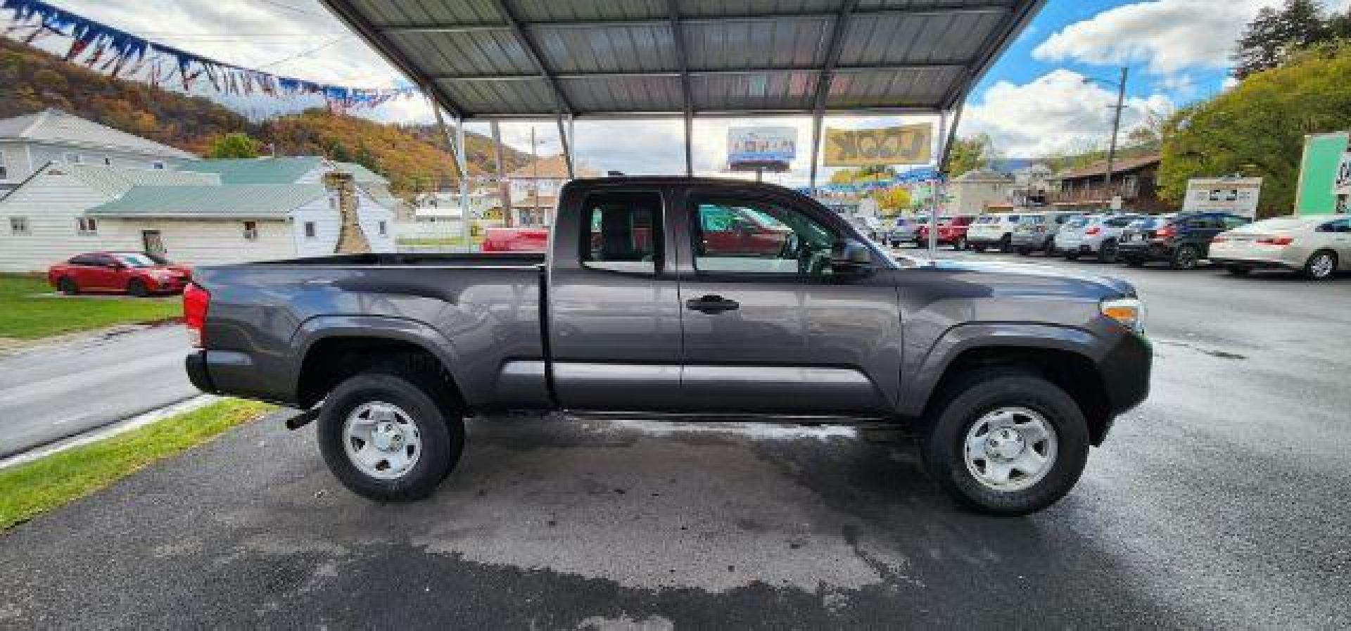 2016 GRAY /Cement Gray Toyota Tacoma SR Access Cab 4x4 (5TFSX5ENXGX) with an 2.7 L4 engine, AT transmission, located at 353 S. Mineral St., Keyser, WV, 26726, (304) 788-7887, 39.436451, -78.981674 - Photo#12